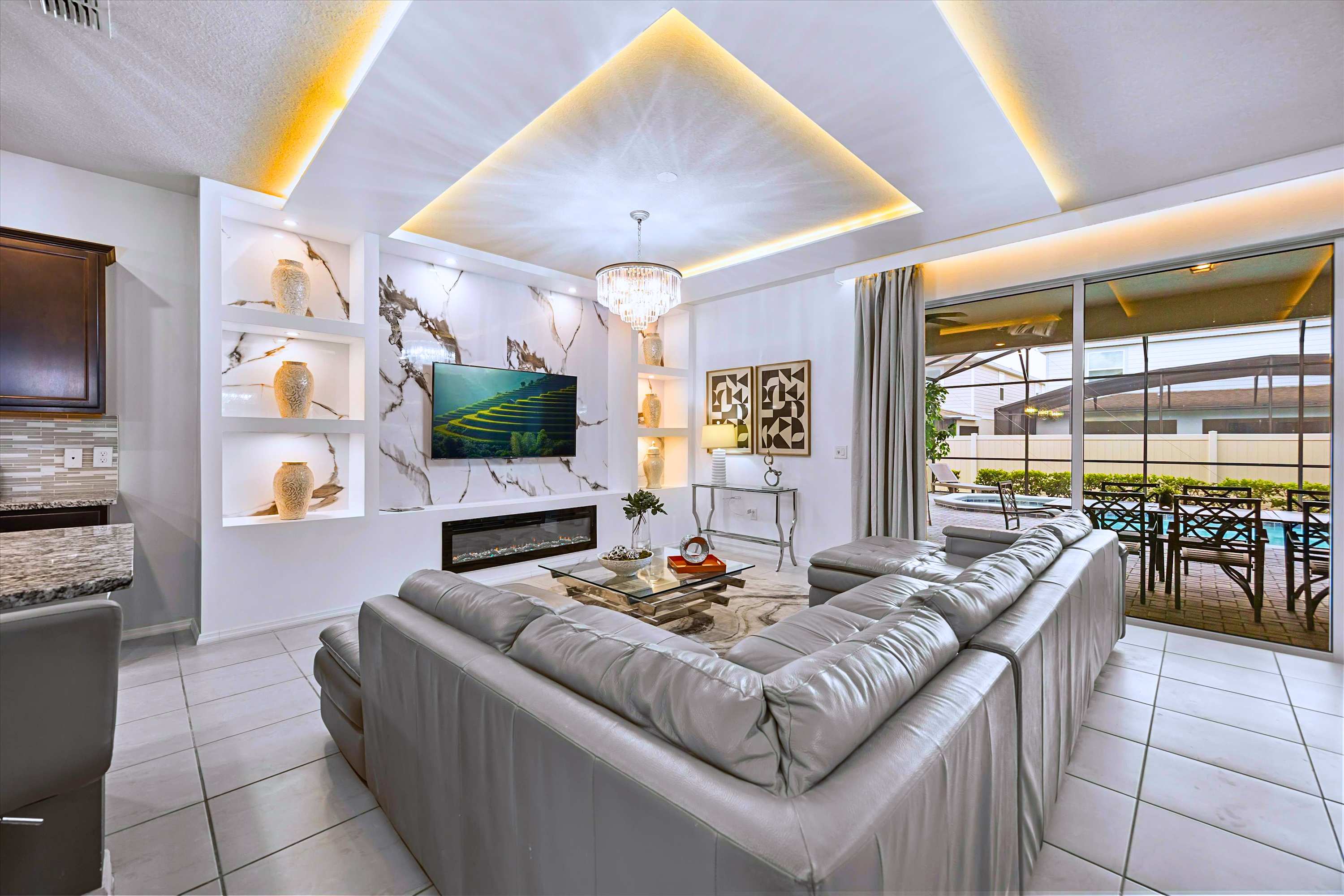 Catch Up on Favorite Movies in Pool-Access Living Room