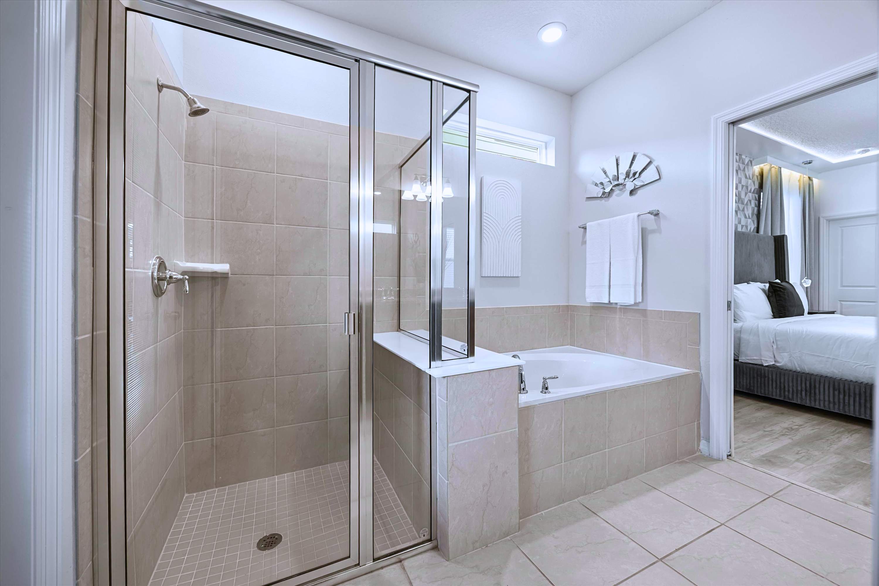 Private Guest Ensuite Featuring Standalone Tub & Glass Shower