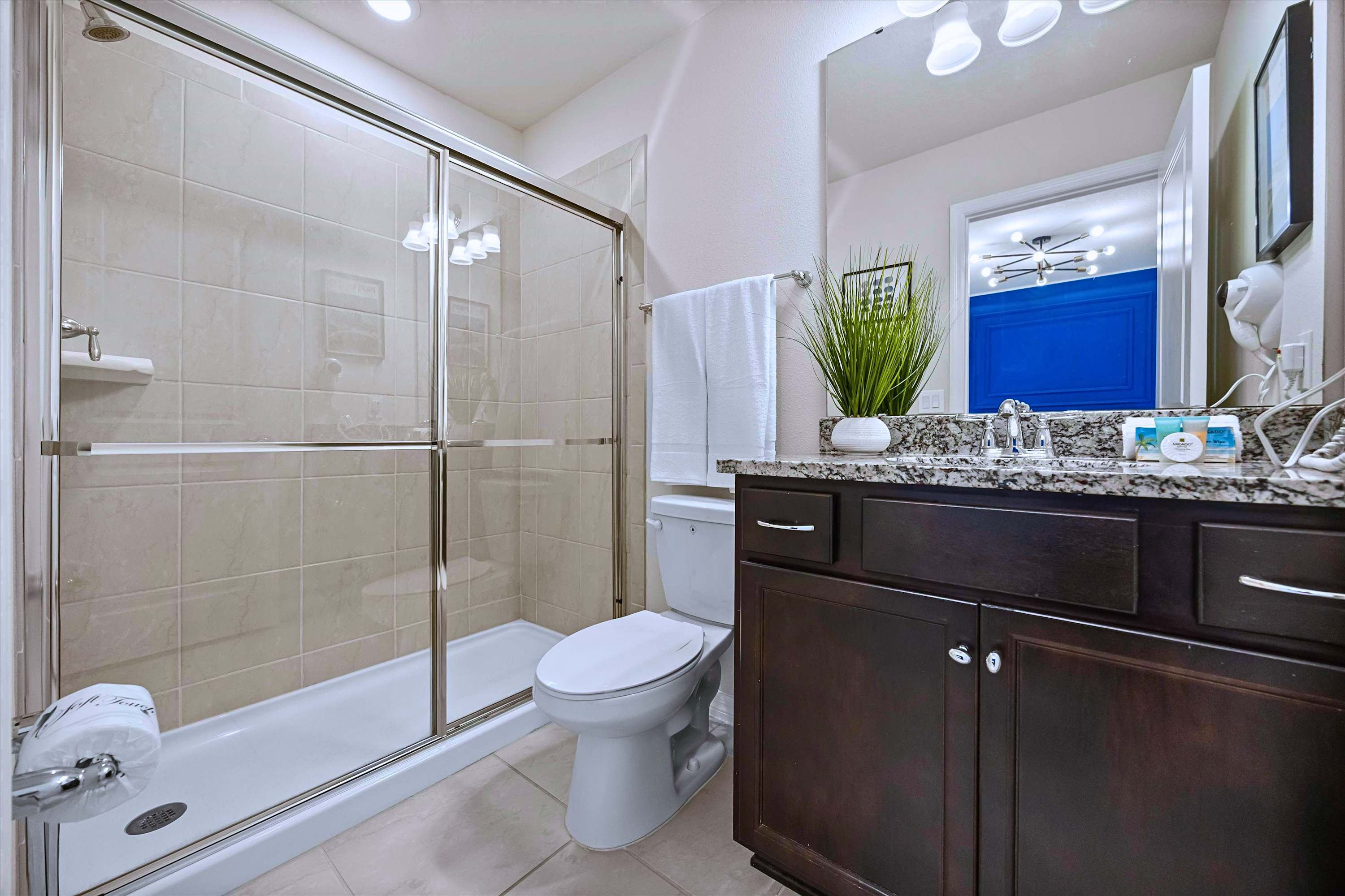 Dedicated Guest Ensuite Featuring Glass Shower Enclosure