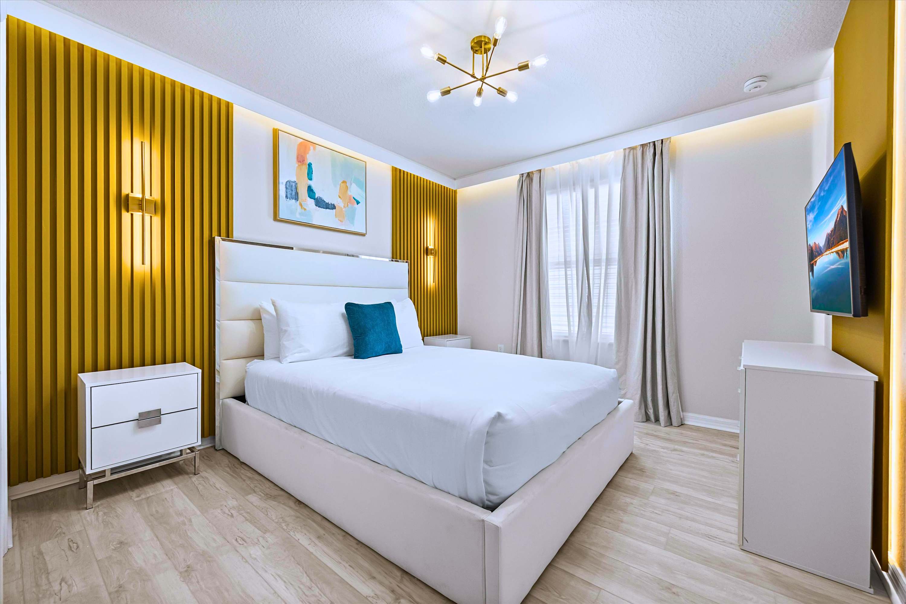 Elegant Queen Bedroom with Golden Wall & Designer Lighting