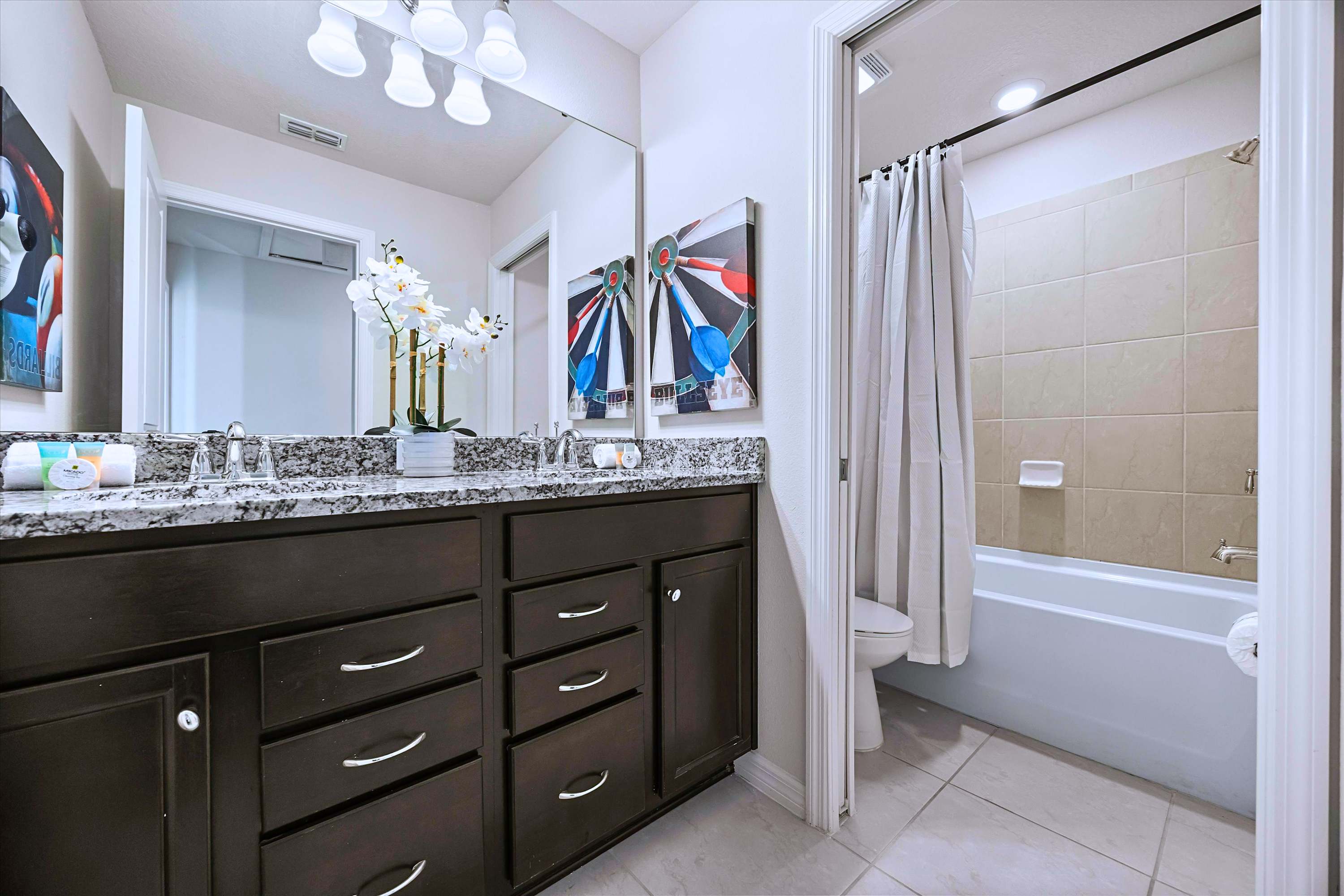 Spacious Family Bathroom with Dual Sinks & Relaxing Bathtub