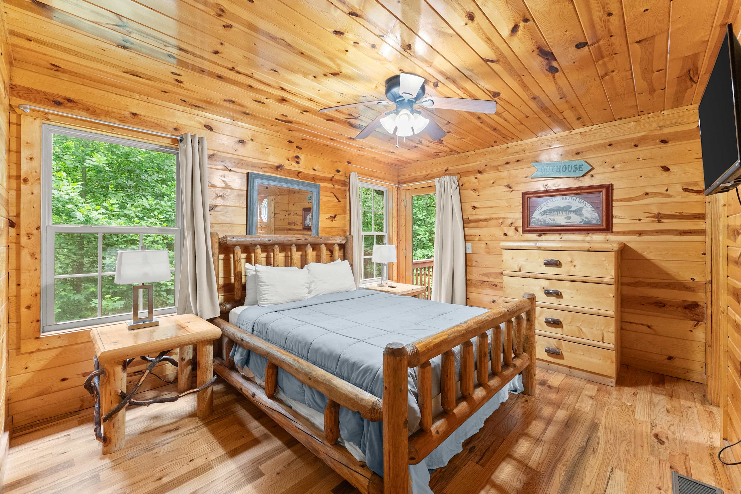 First bedroom on the main floor with a Queen bed