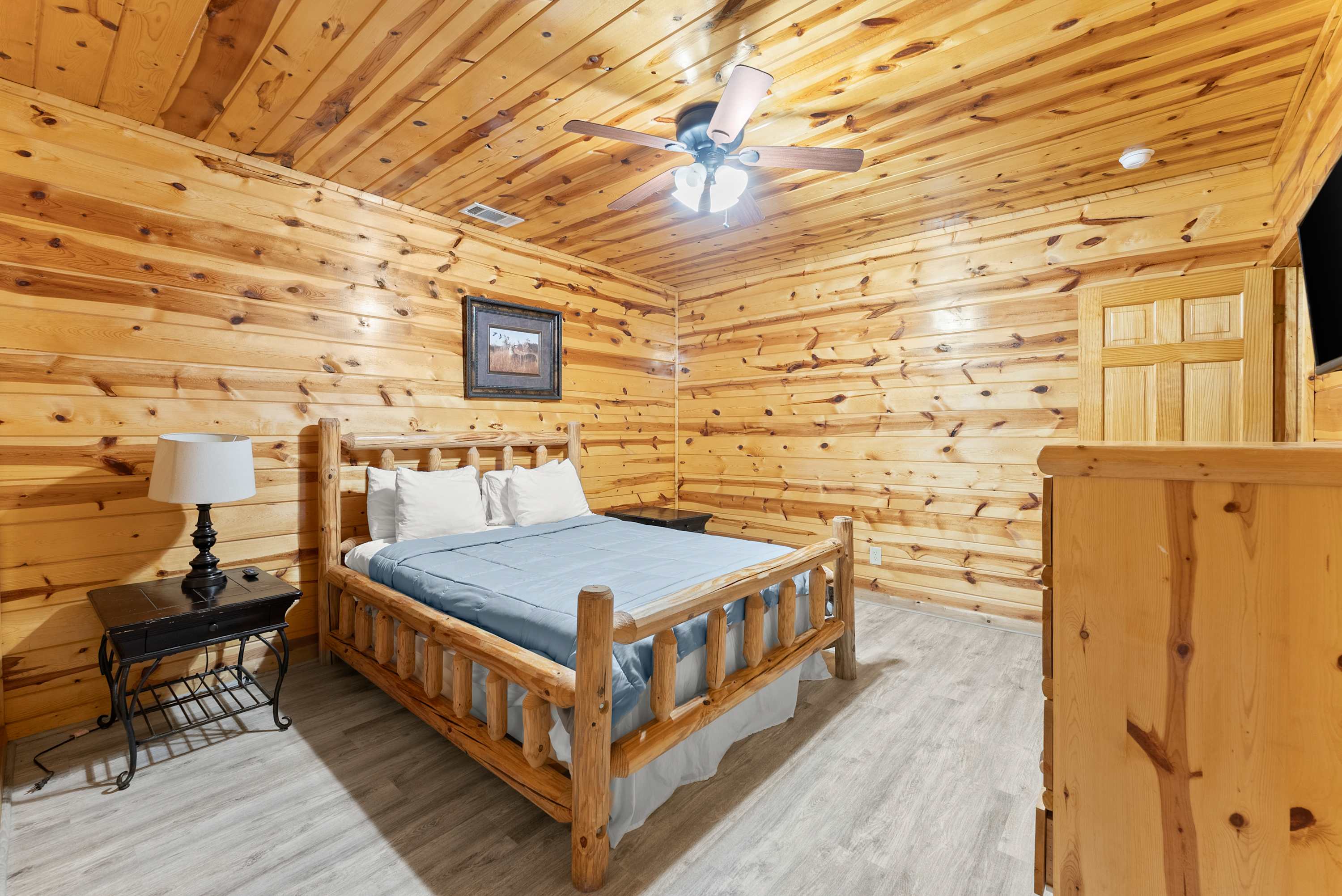 Downstairs bedroom with a Queen bed
