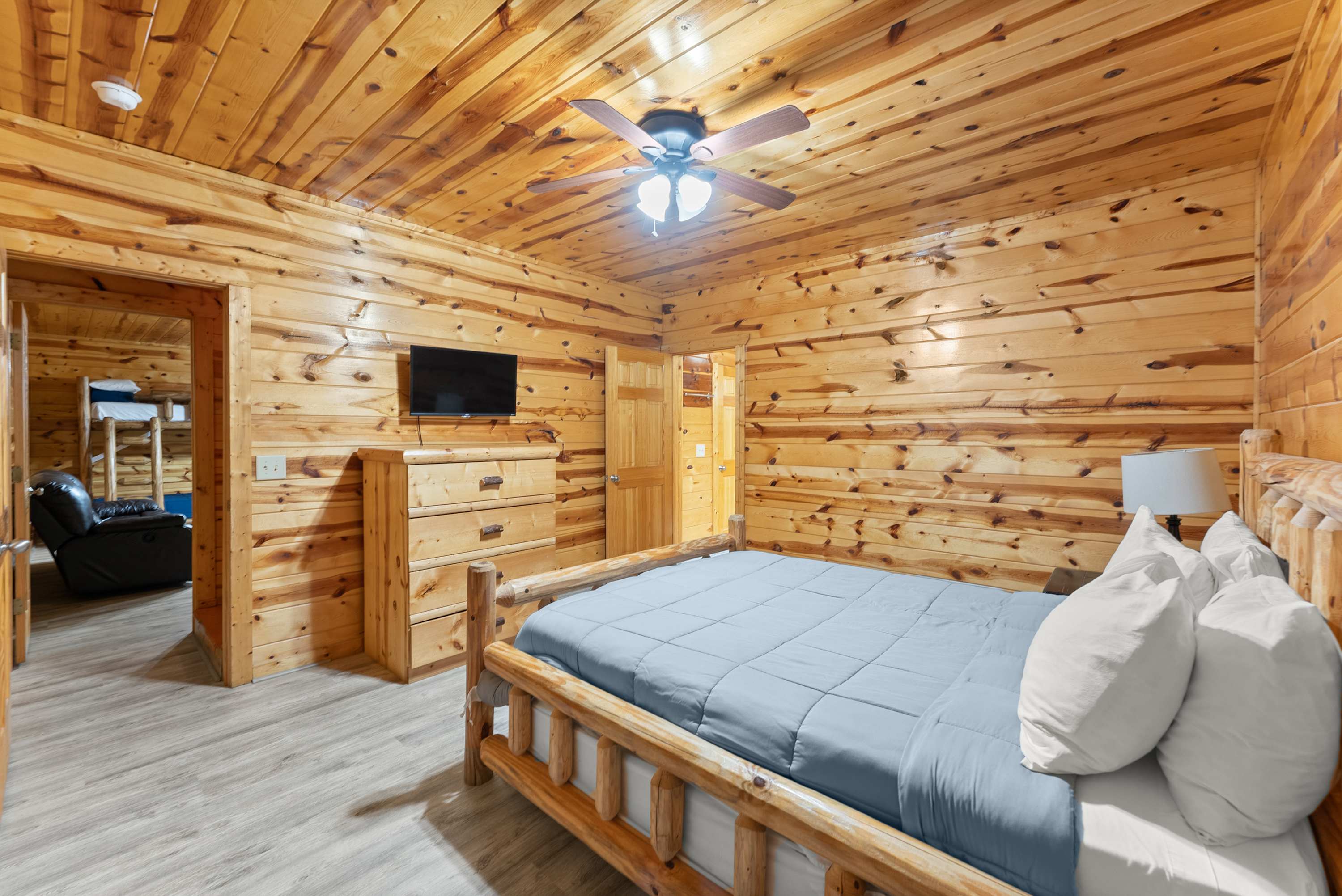 Downstairs bedroom with a Queen bed