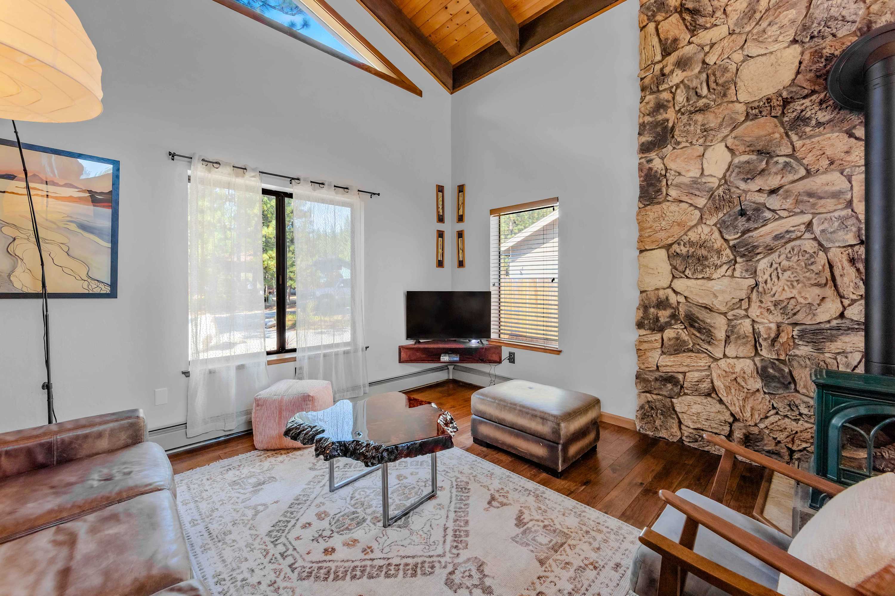 Open-concept living area featuring comfortable seating, a Smart TV, and a welcoming space to relax and unwind.