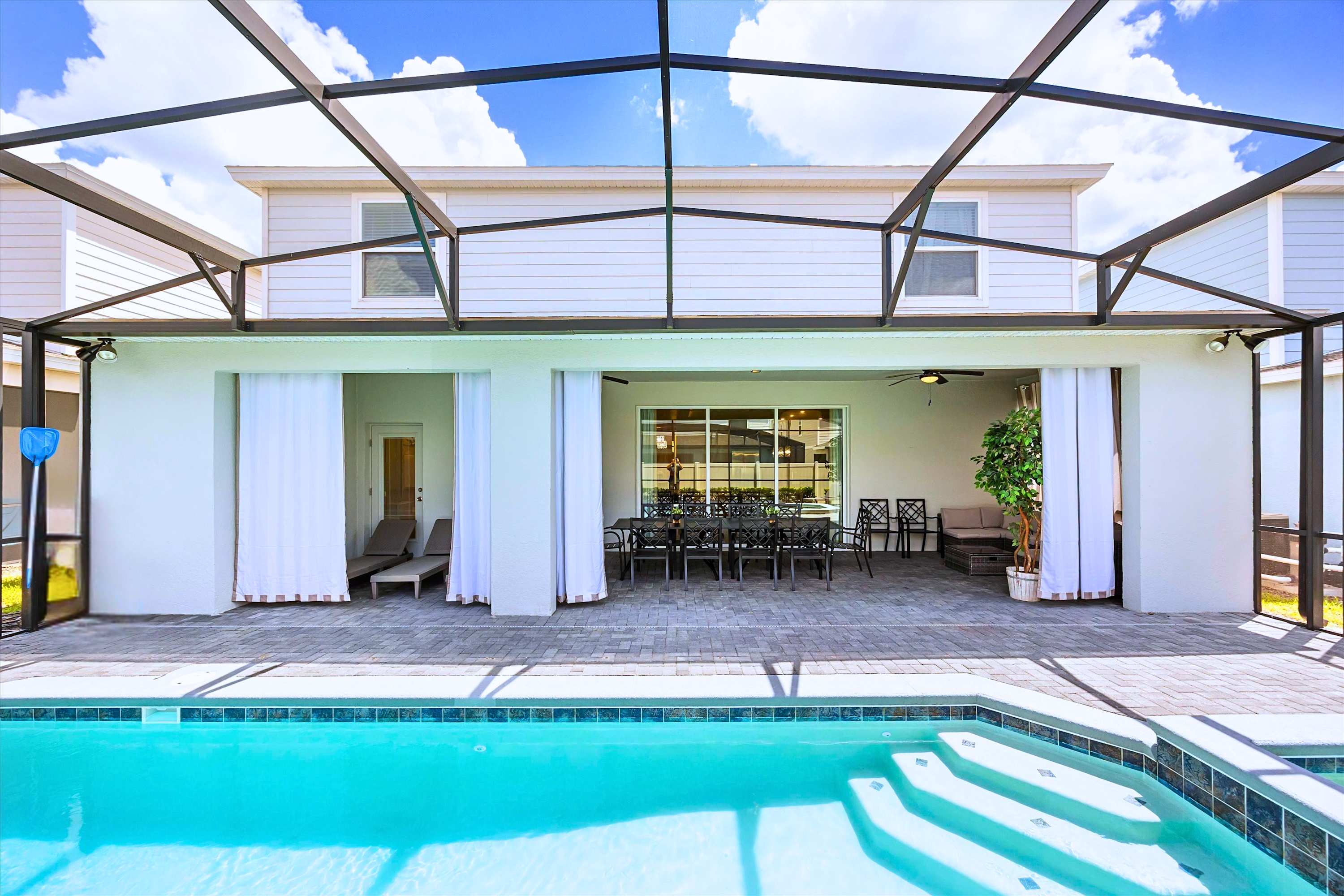 Private screened-in swimming pool and outdoor patio