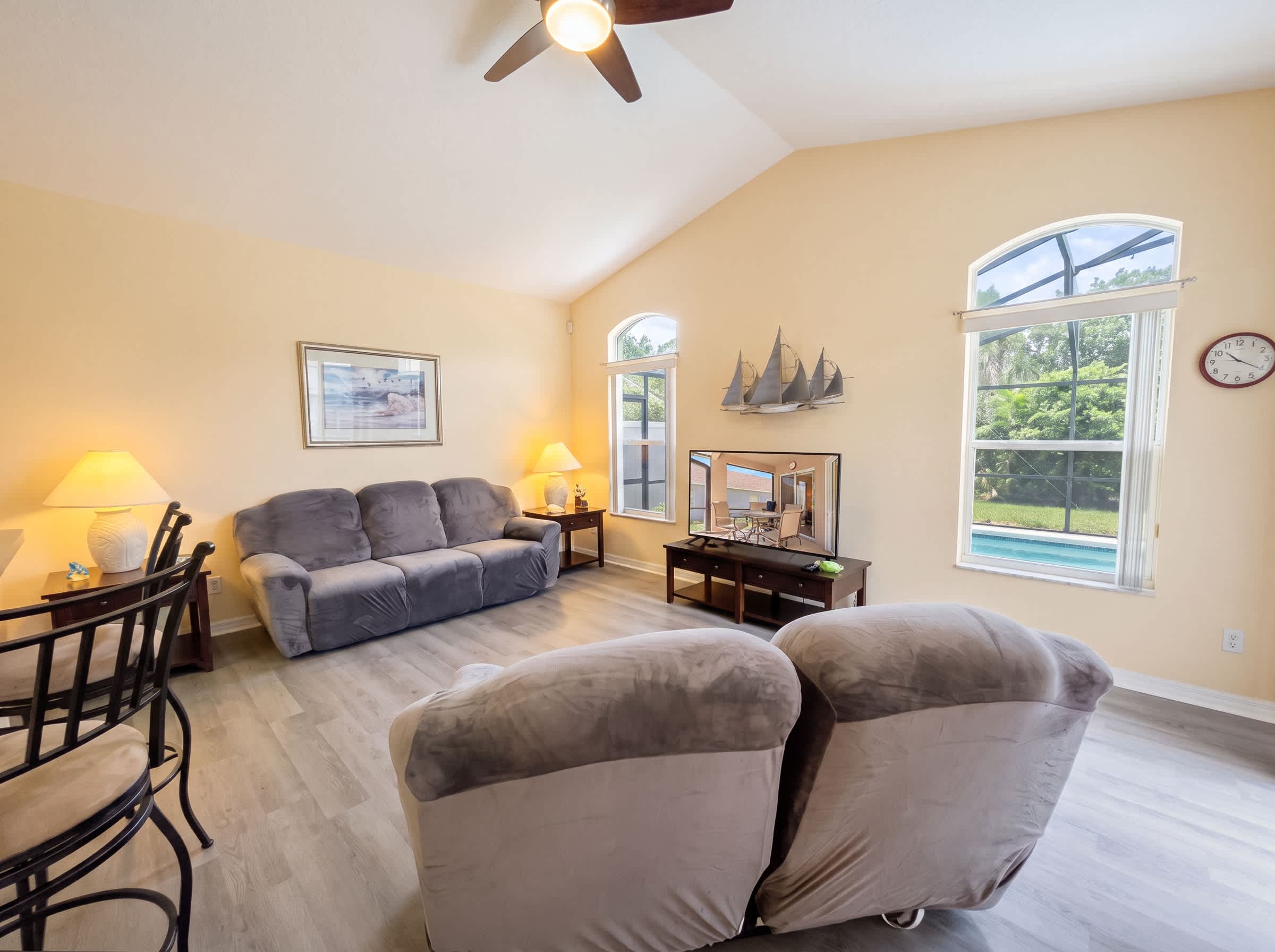 Cozy sitting room with comfortable seating and a TV