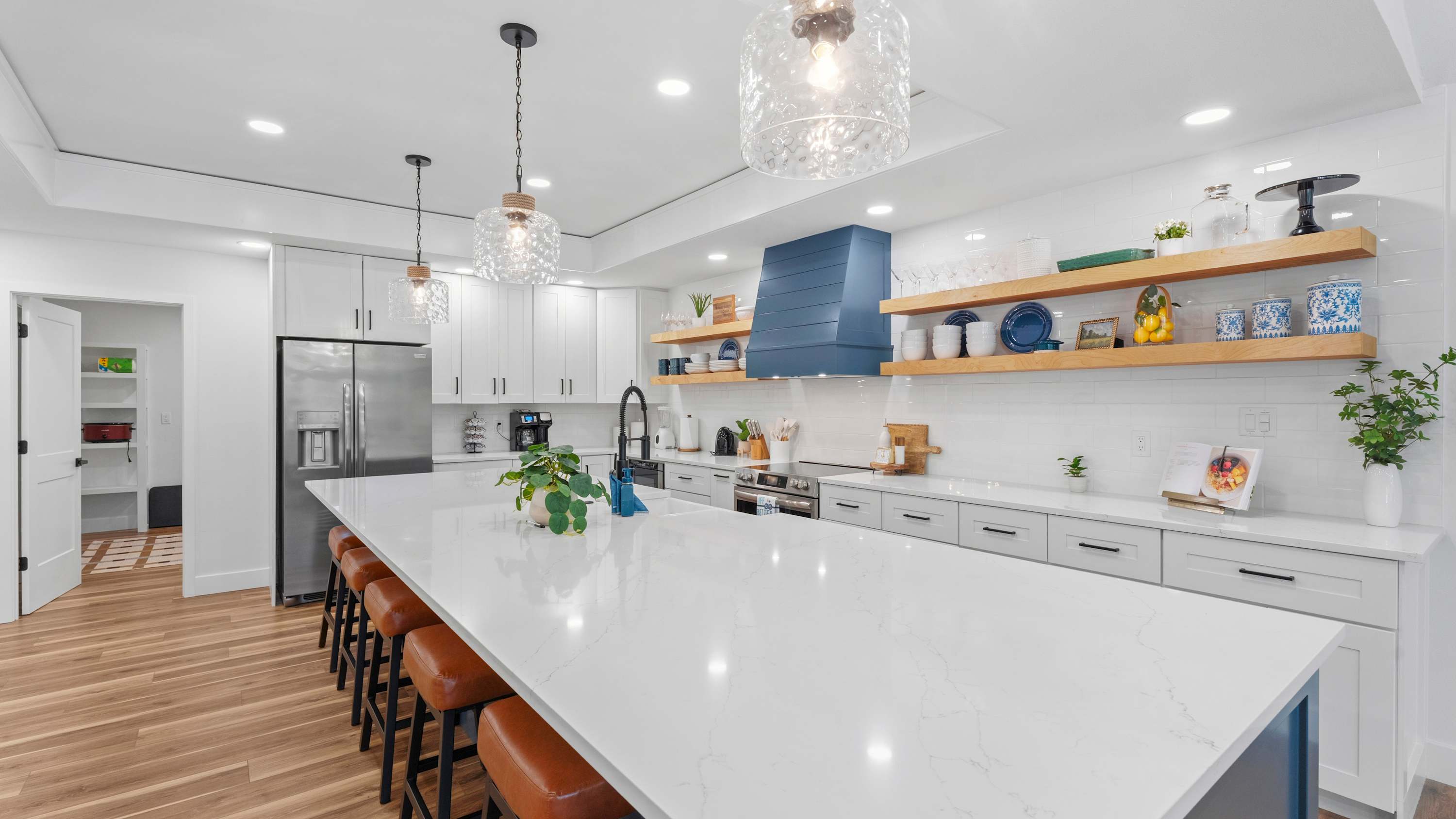 The open kitchen offers ample space & all the comforts of home​