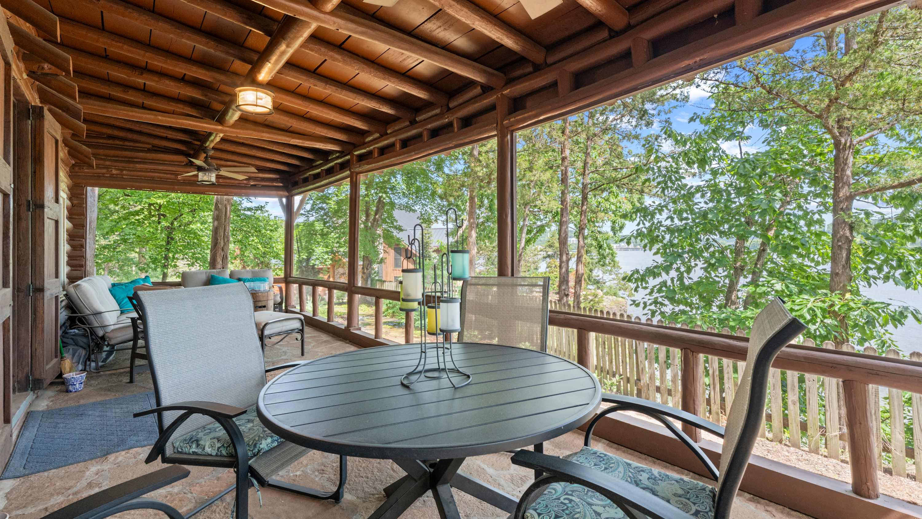 Dine on the screened-in back patio with lake views