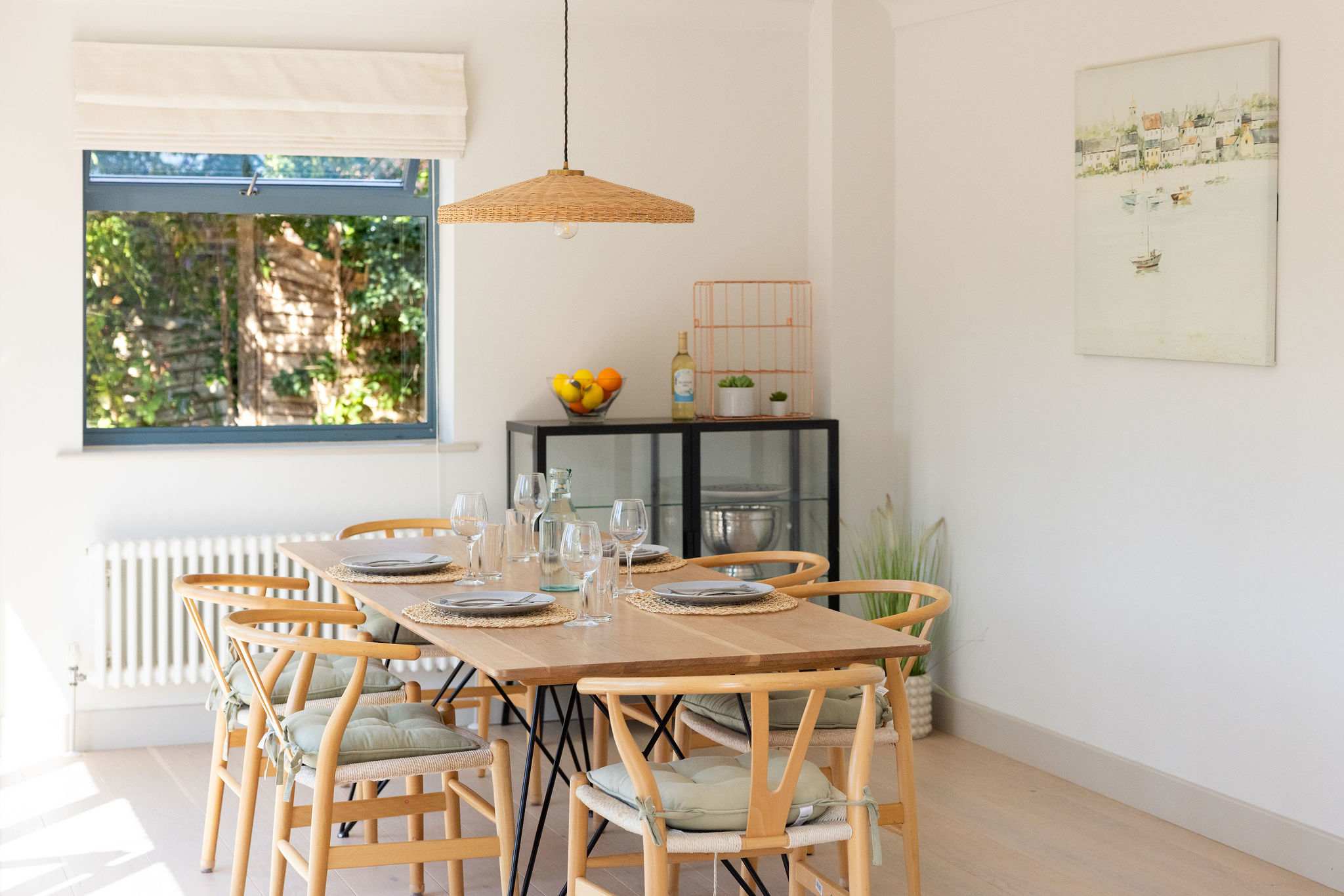 Dining Area - Our contemporary open-plan dining space, with a stylish table comfortably seating six — perfect for relaxed breakfasts, long lunches and memorable meals together.