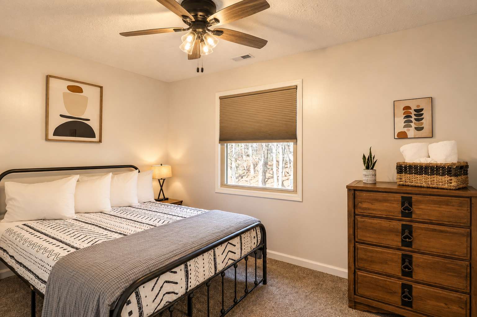 Bedroom 2 (upper level): Queen bed, ceiling fan and Jack-and-Jill shower/tub combination bathroom shared with Bedroom 3

