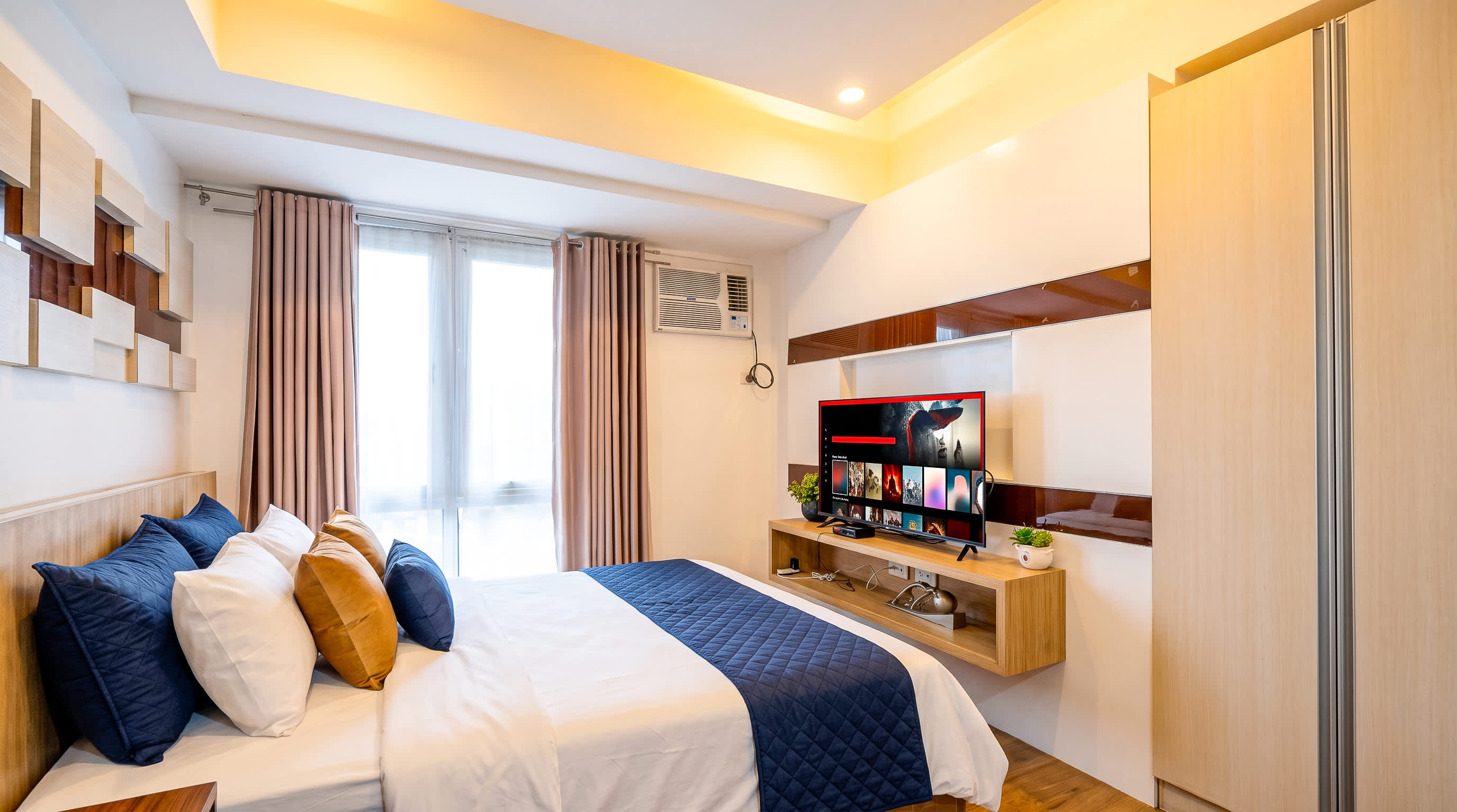NEW Deluxe Queen Studio · Next to Abreeza Ayala Mall
