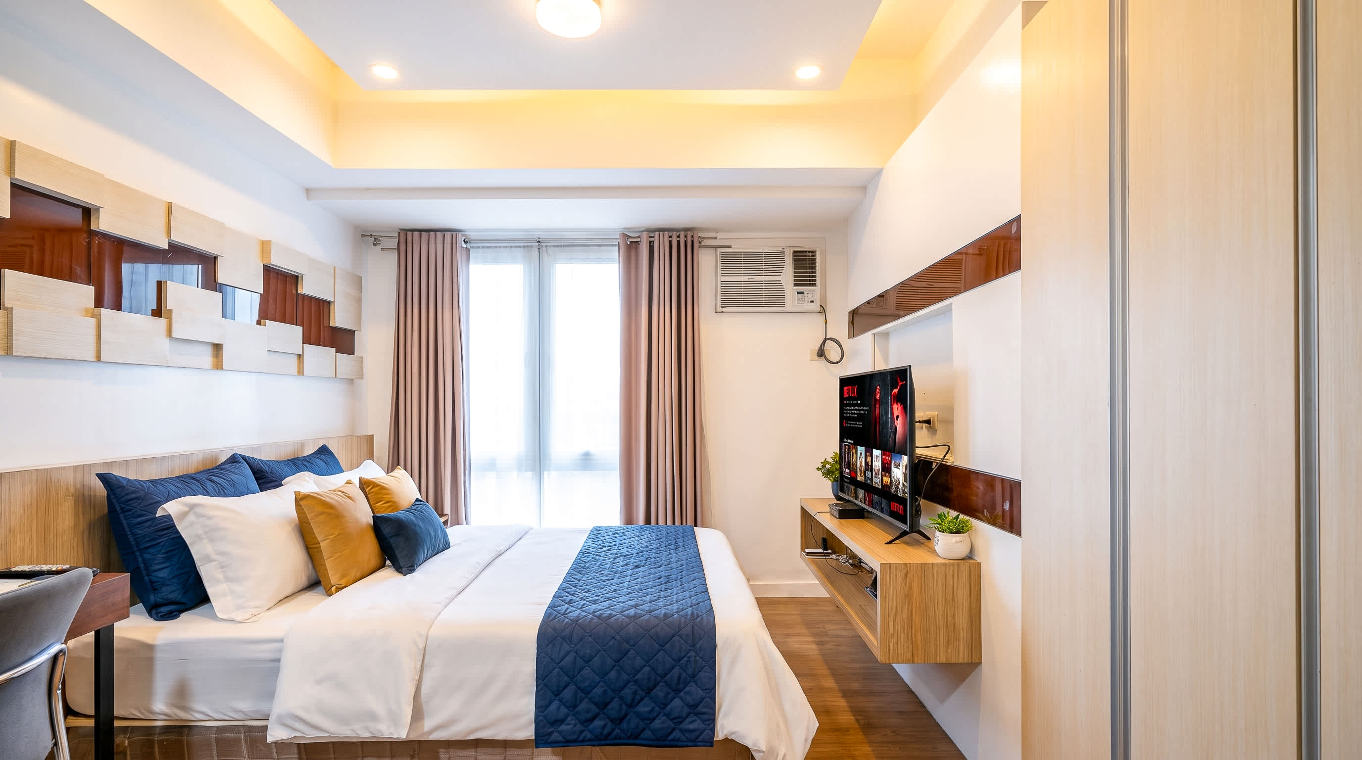 NEW Deluxe Queen Studio · Next to Abreeza Ayala Mall