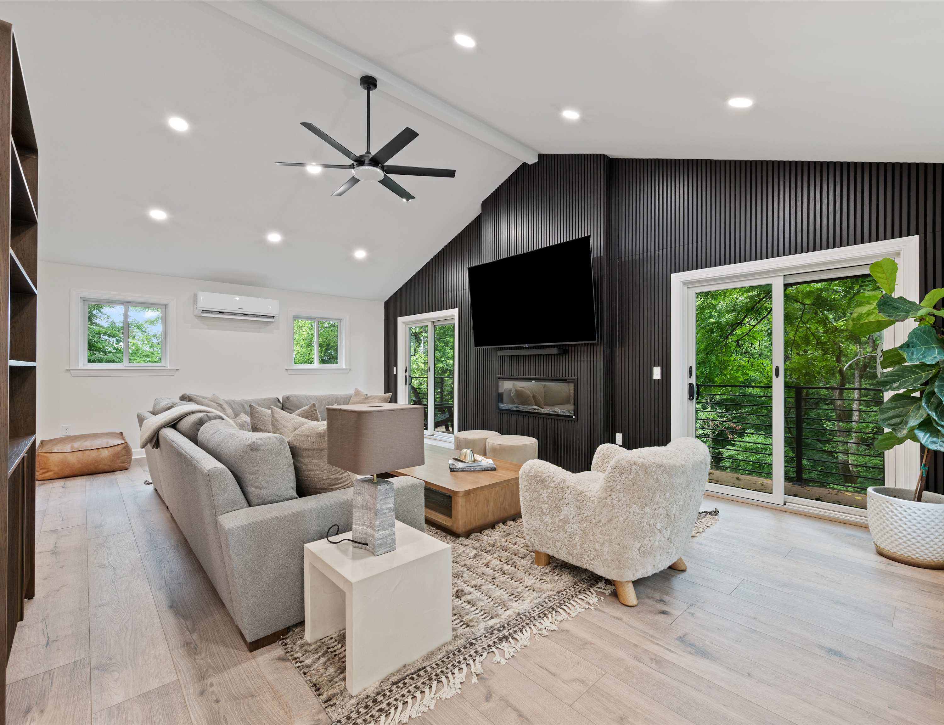 Curl up in the chic living room & stream your favorites on the smart TV​