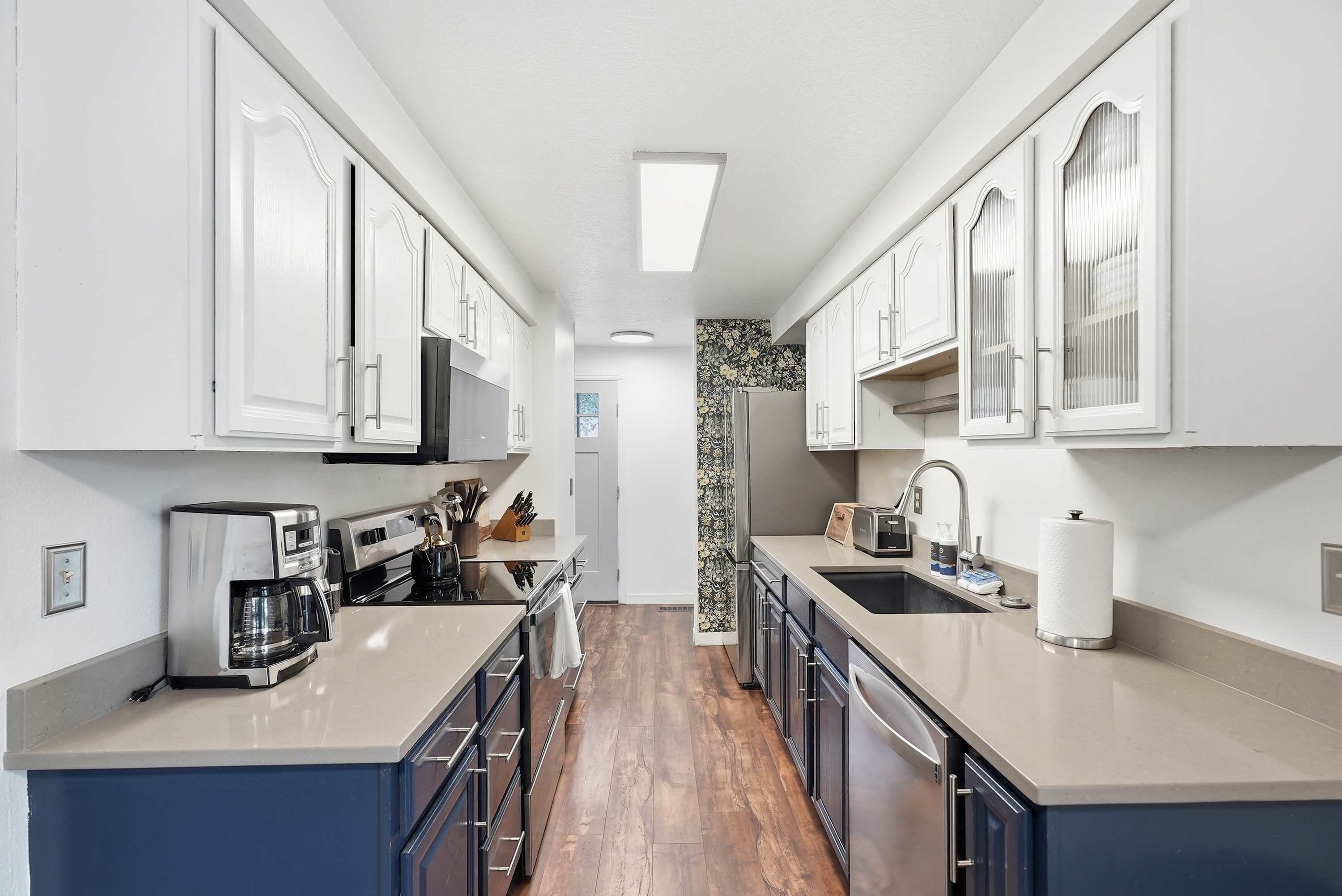 The galley-style kitchen is well equipped for an unforgettable getaway​