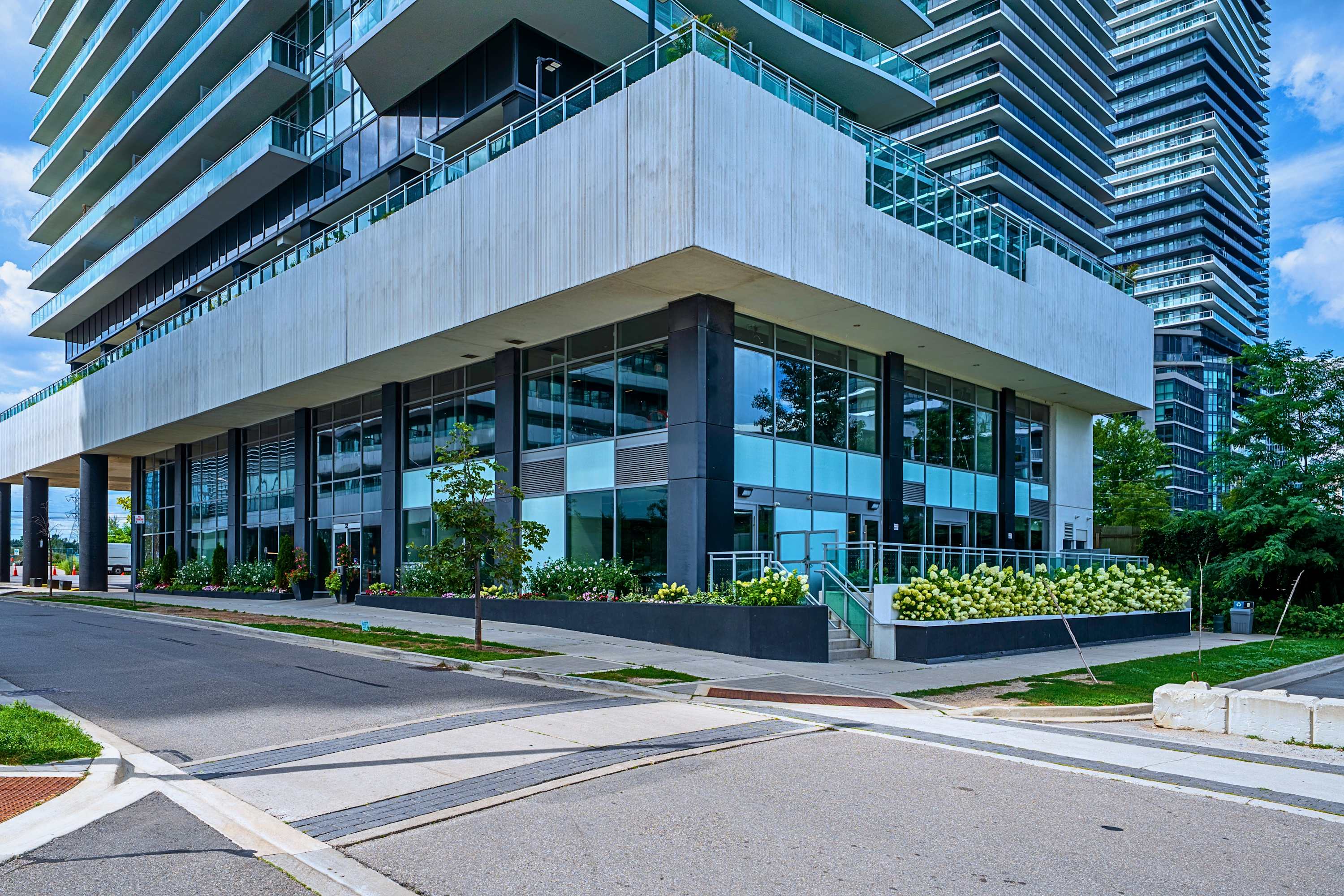 Exterior view of the high-rise condo building hosting your unit.