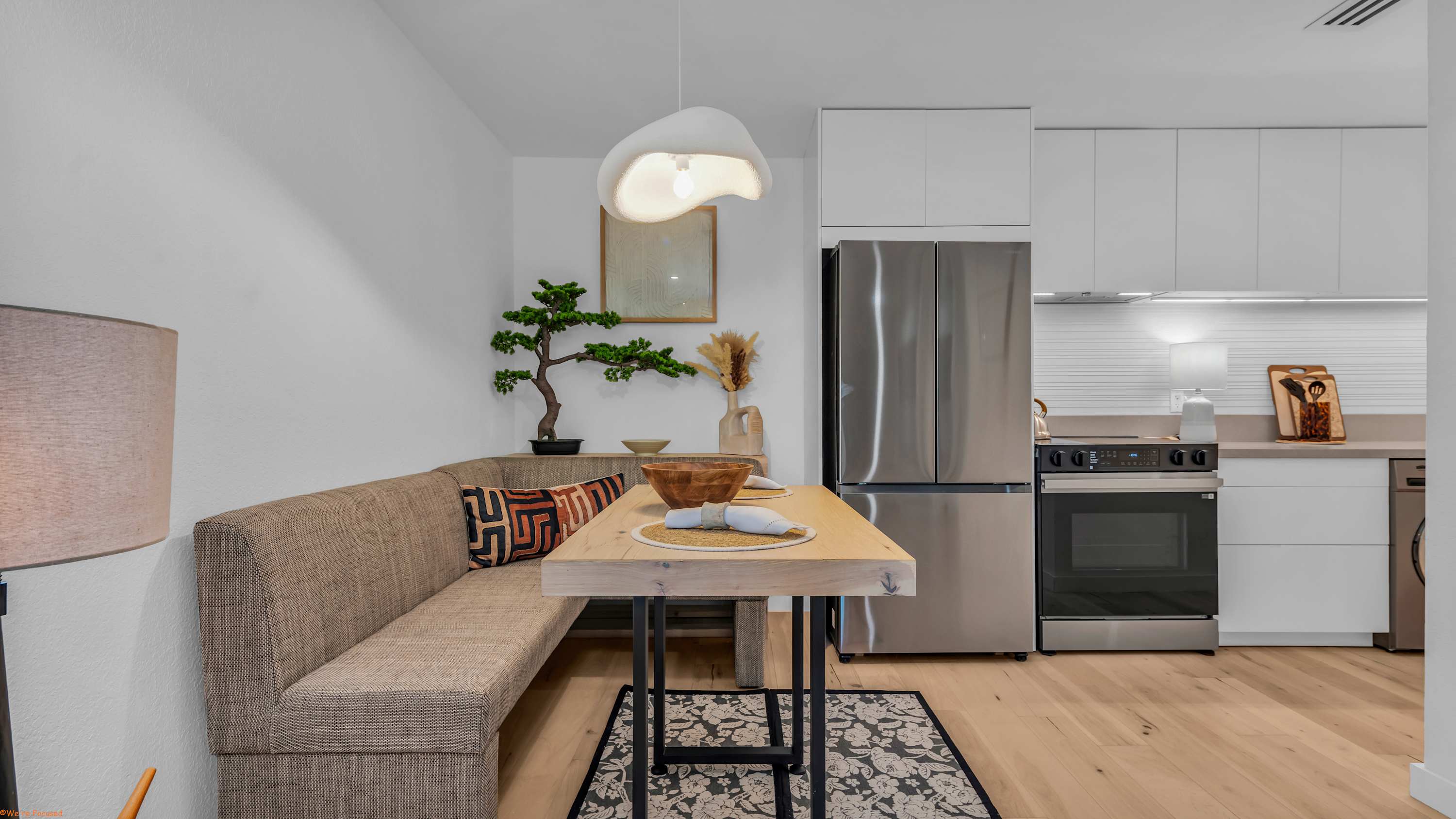 The sleek, eat-in kitchen with dining space for 4 is well equipped for an unforgettable getaway​