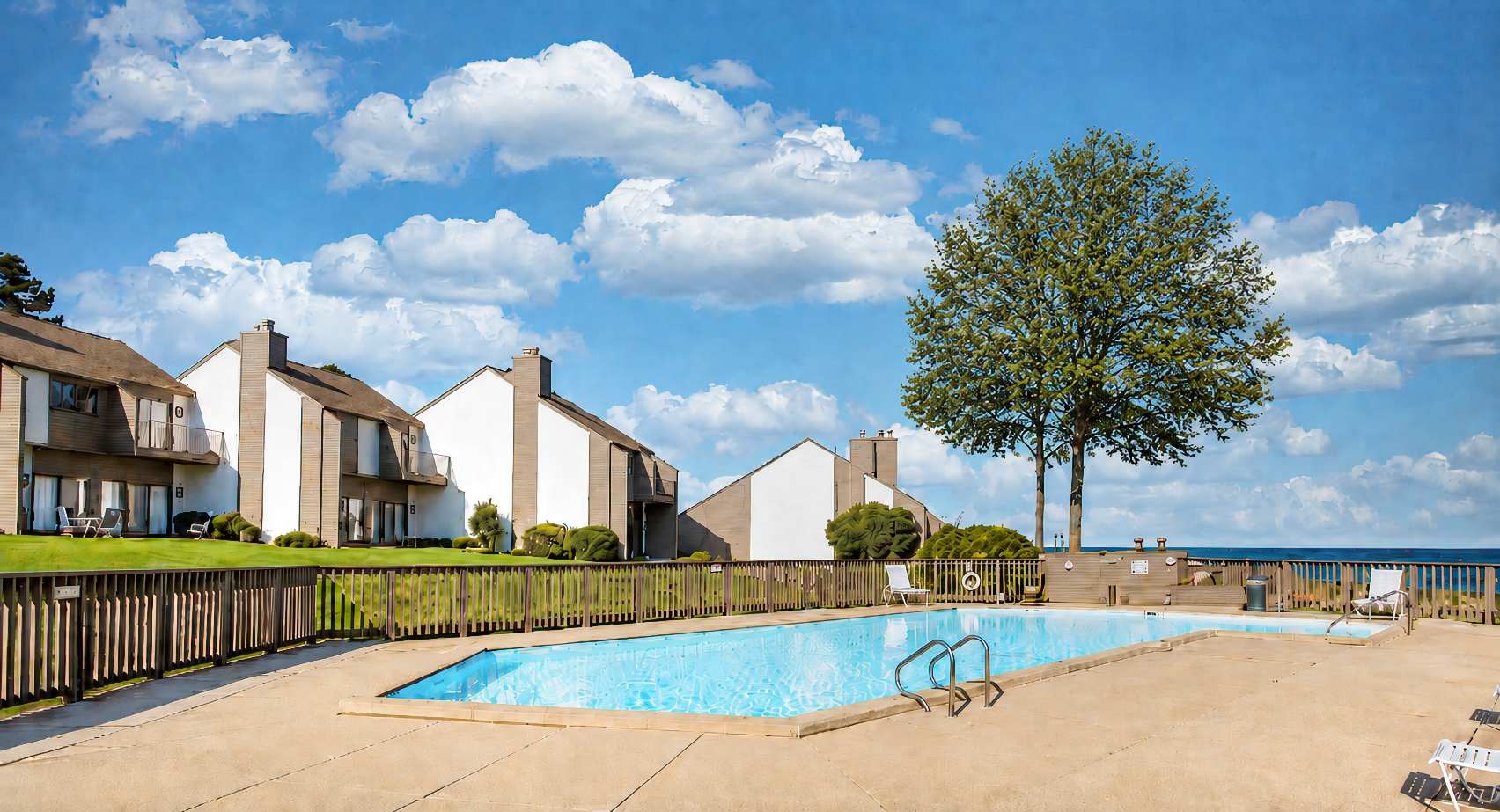 Spend sunny afternoons at the heated community pool just steps from the shoreline