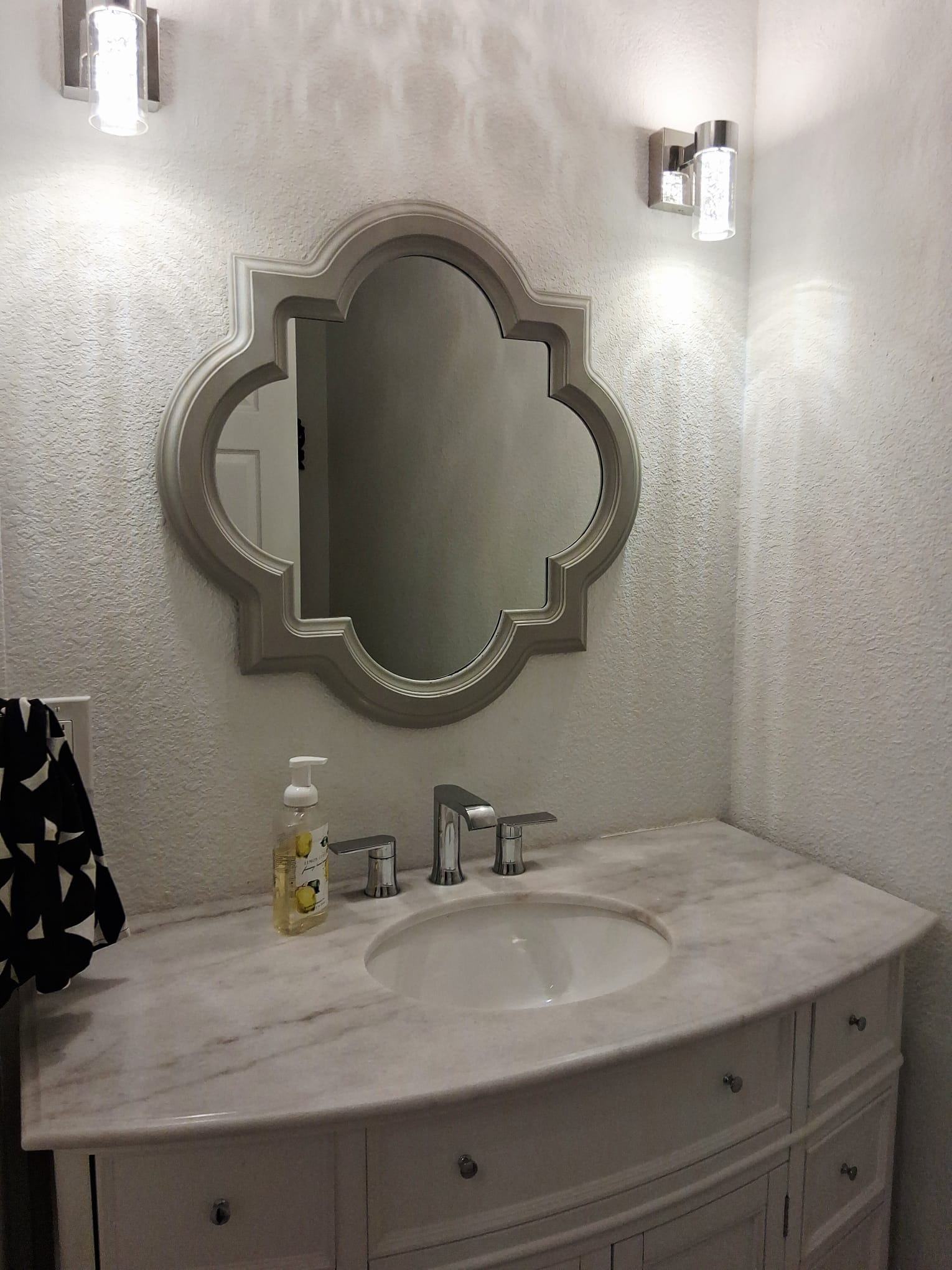 Guest Powder Room (sink and toilet) located in the main house to the right of the front door.