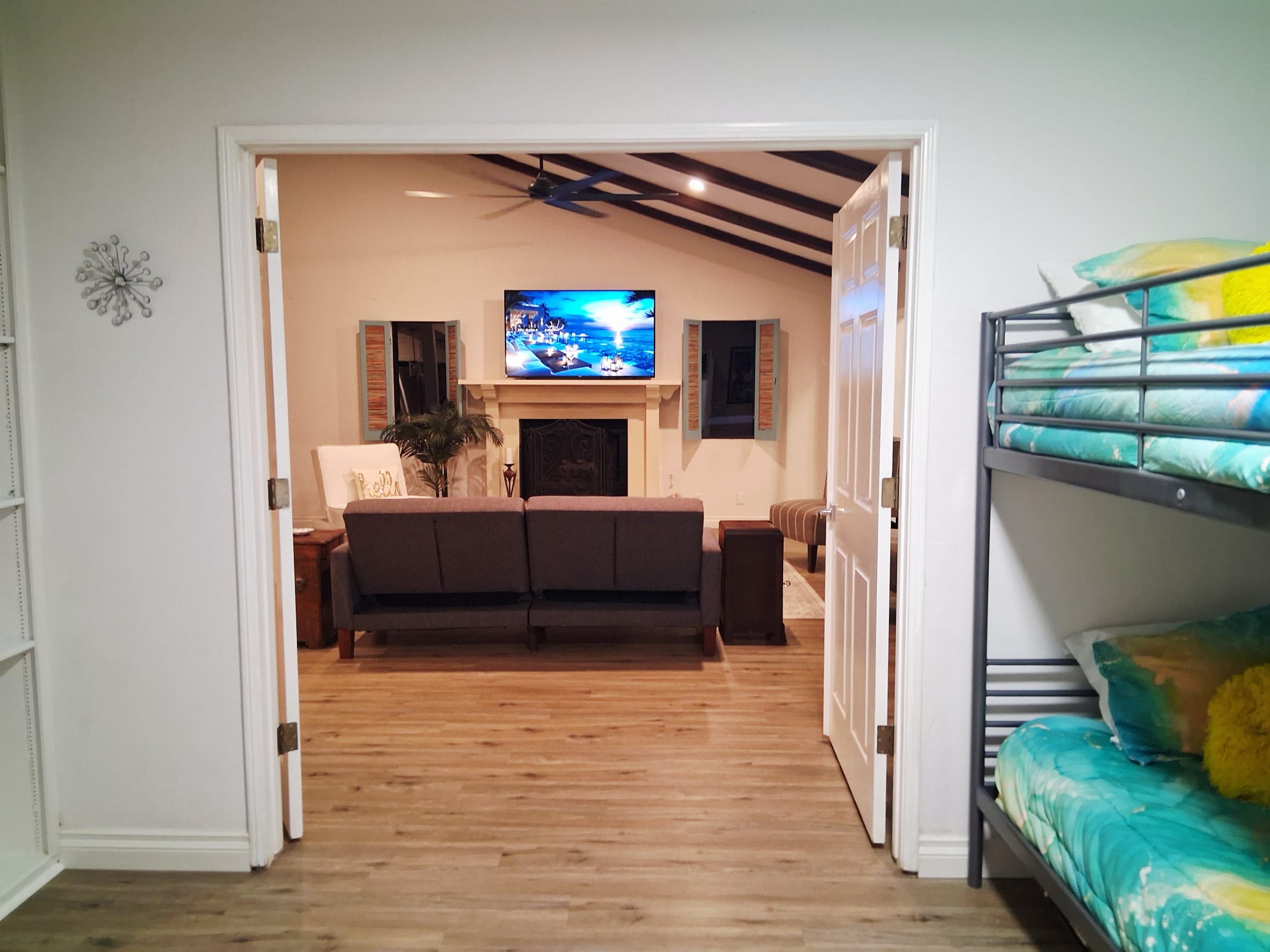 Guest Bedroom #3 provides a bunk bed with two singles and a TV.