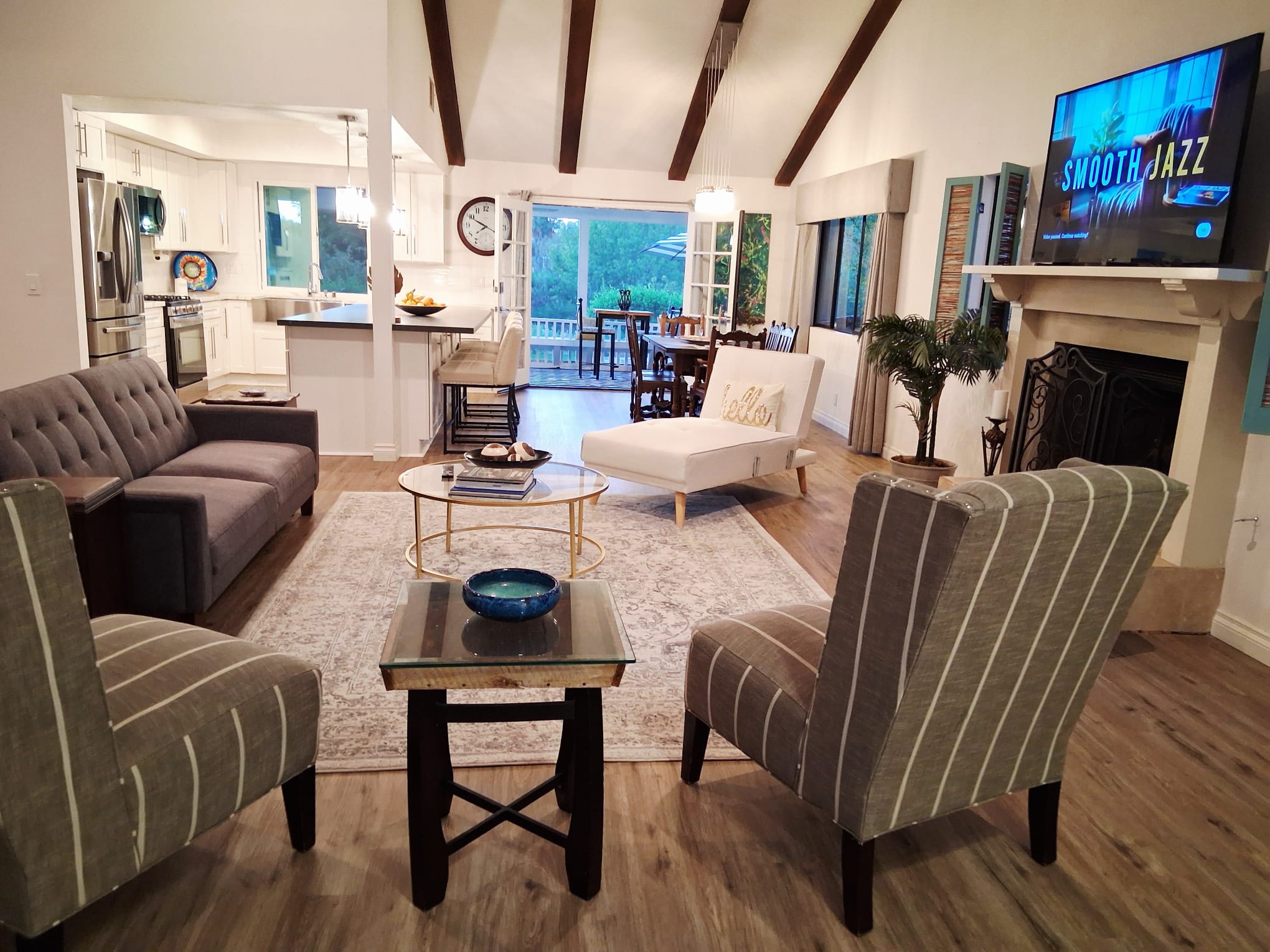 Open living concept of living room, dining room and kitchen
