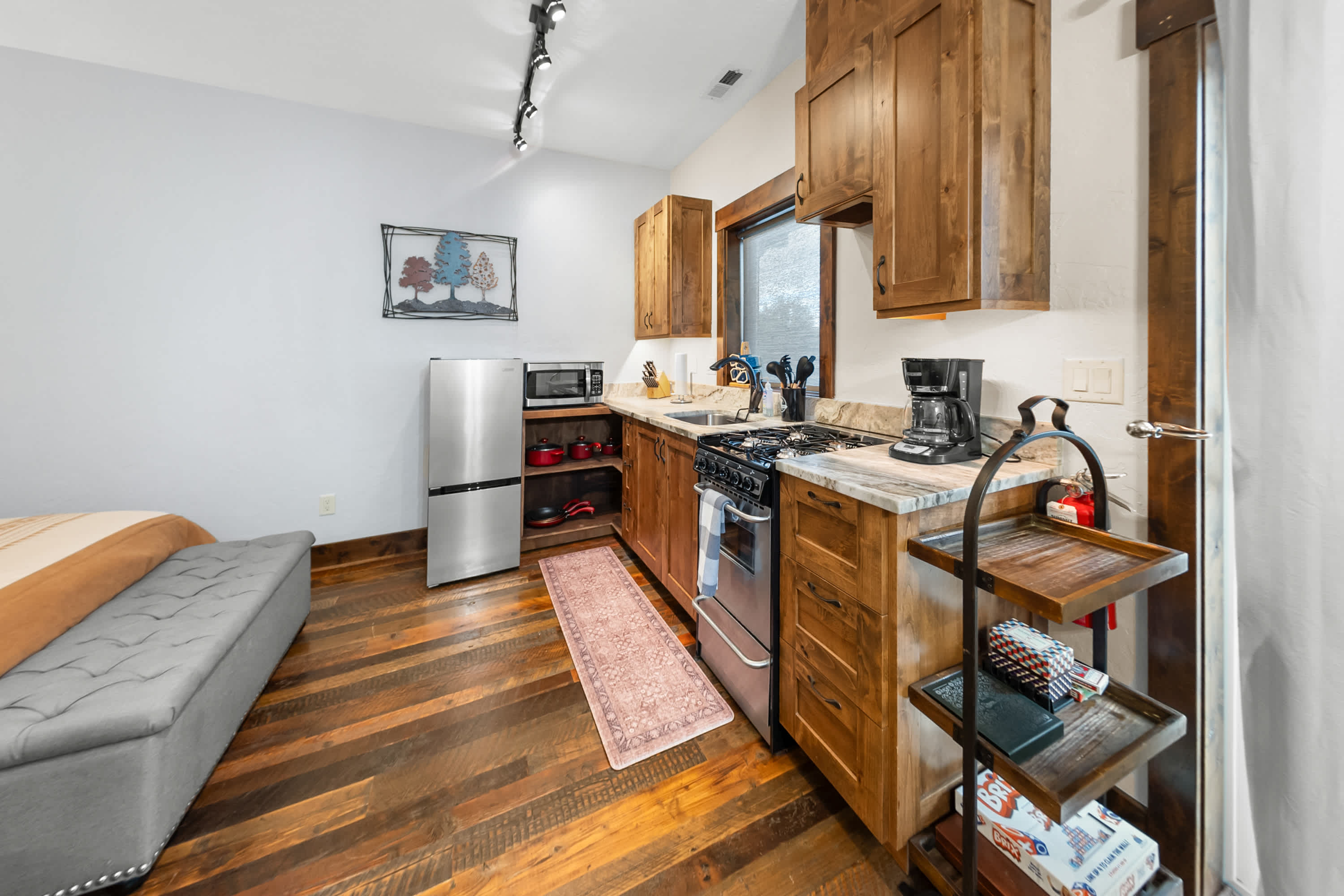Enjoy the convenience of a well-equipped kitchenette for simple meals and snacks