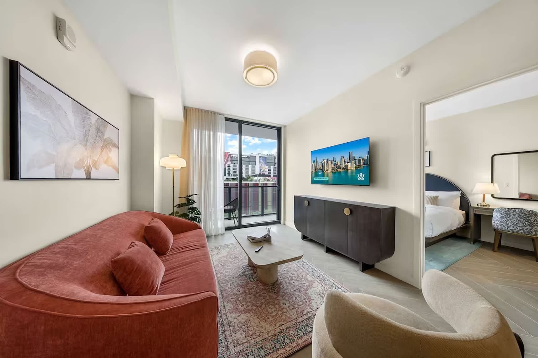 Unwind in the chic living room & stream your favorites on the smart TV​