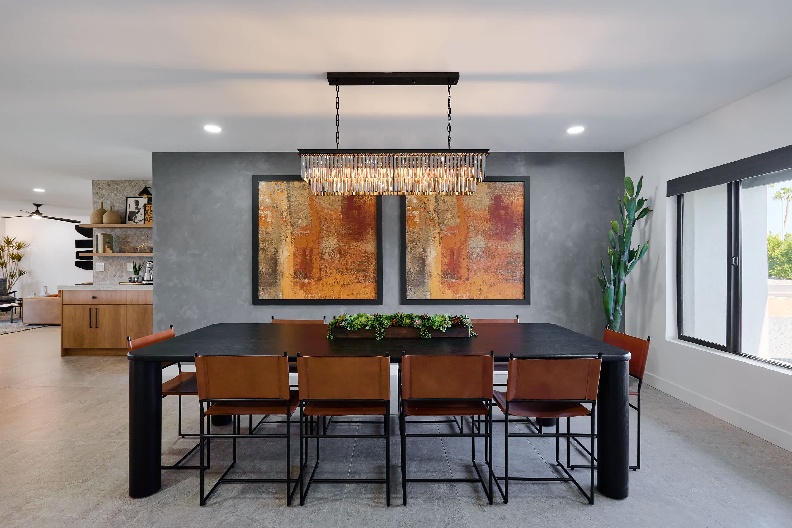 Formal dining area with designer furnishings, stunning chandelier. and seating for 10.