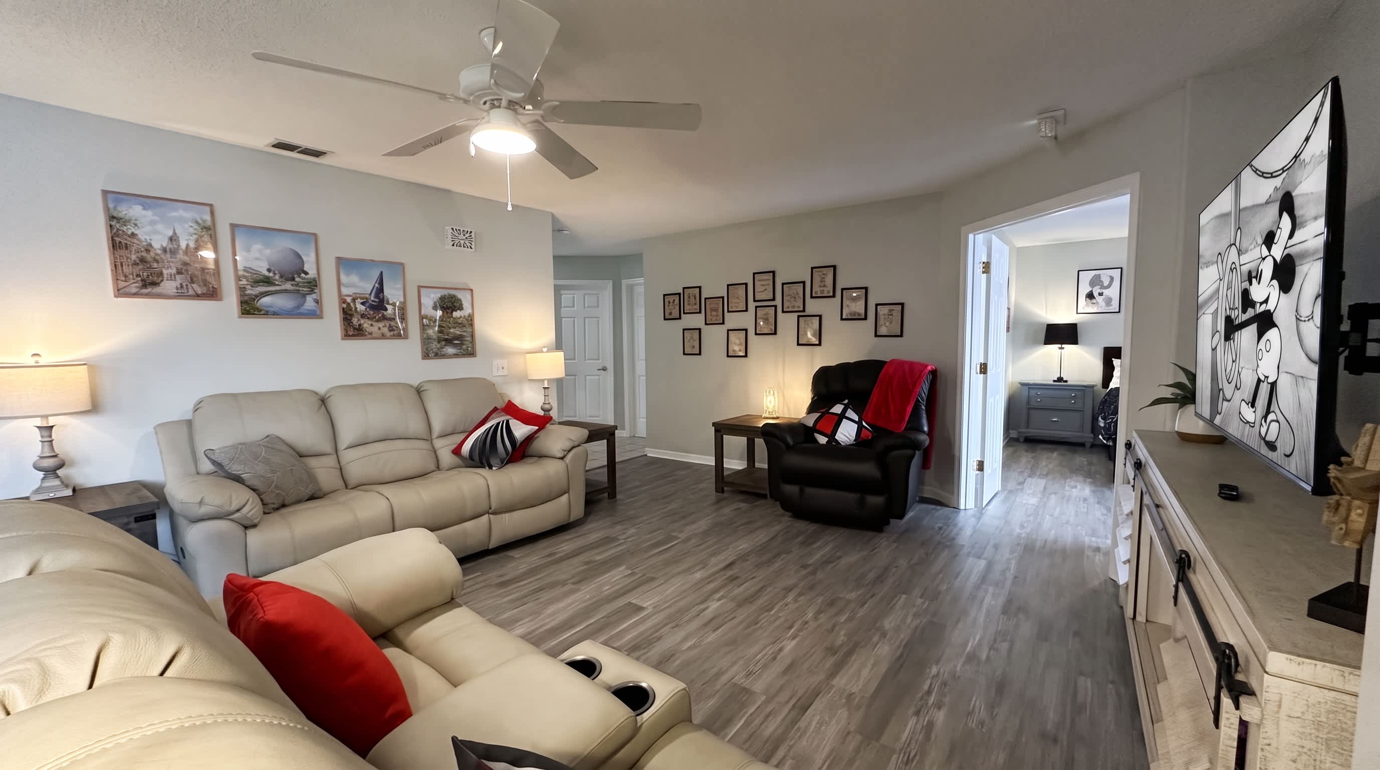 Relax in the inviting living area, featuring a comfortable sofa sleeper and Smart TV