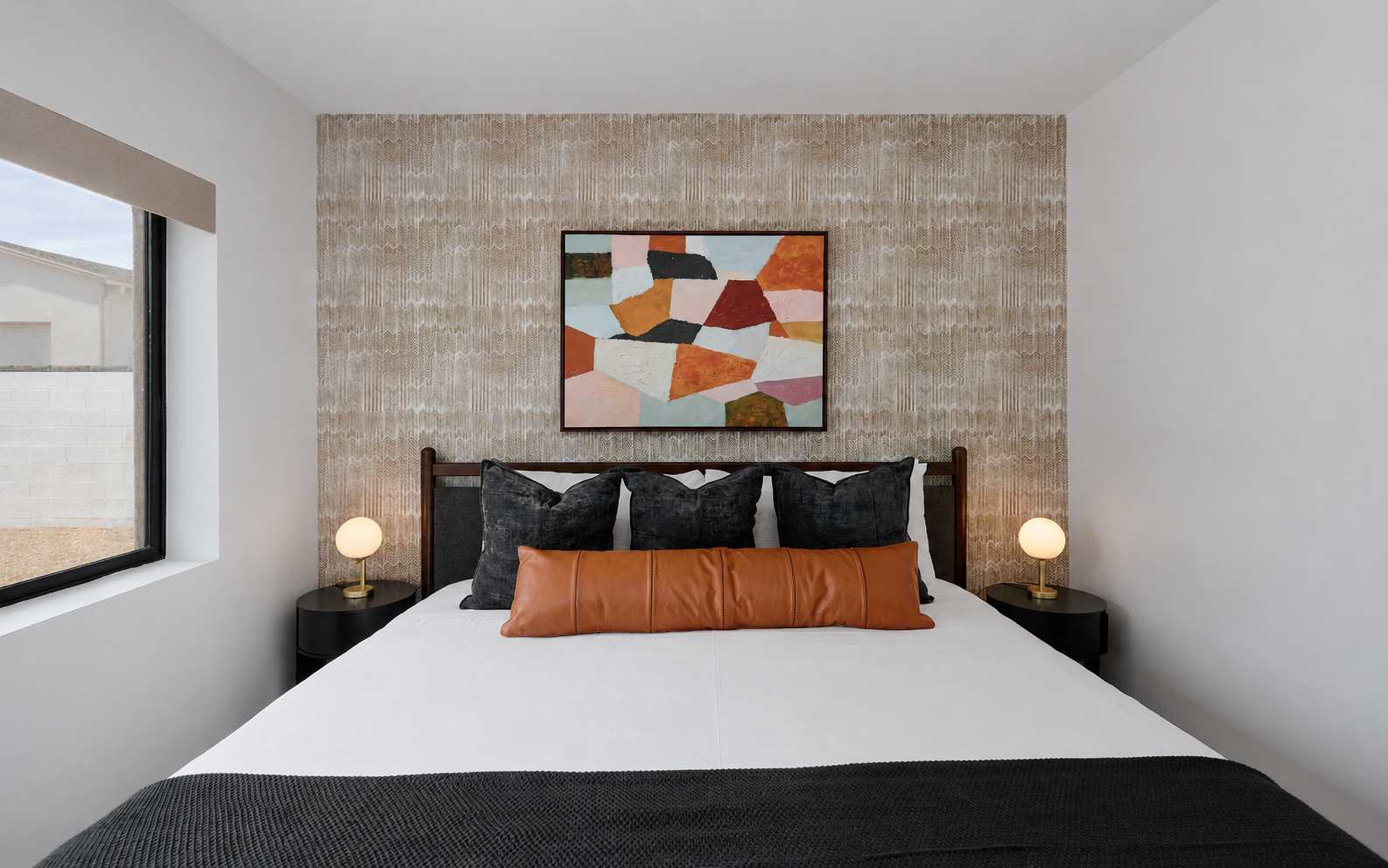 2nd bedroom with King bed and designer furnishings.