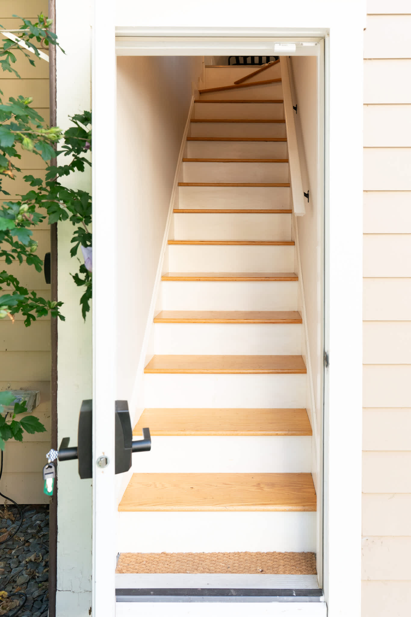 Step through the entrance and follow the wooden staircase up to your carriage house retreat.