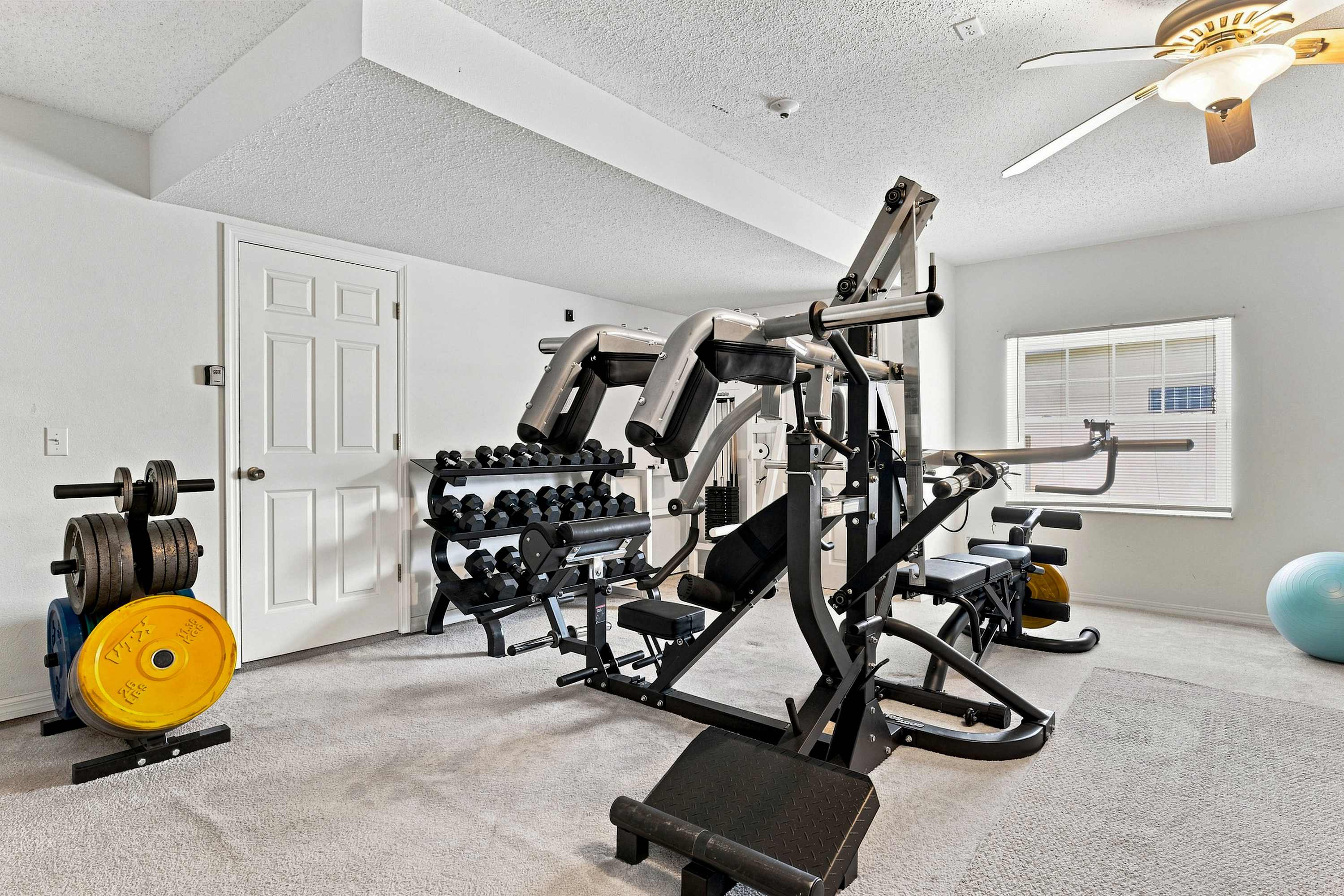 Keep up with your routine in this private fitness room