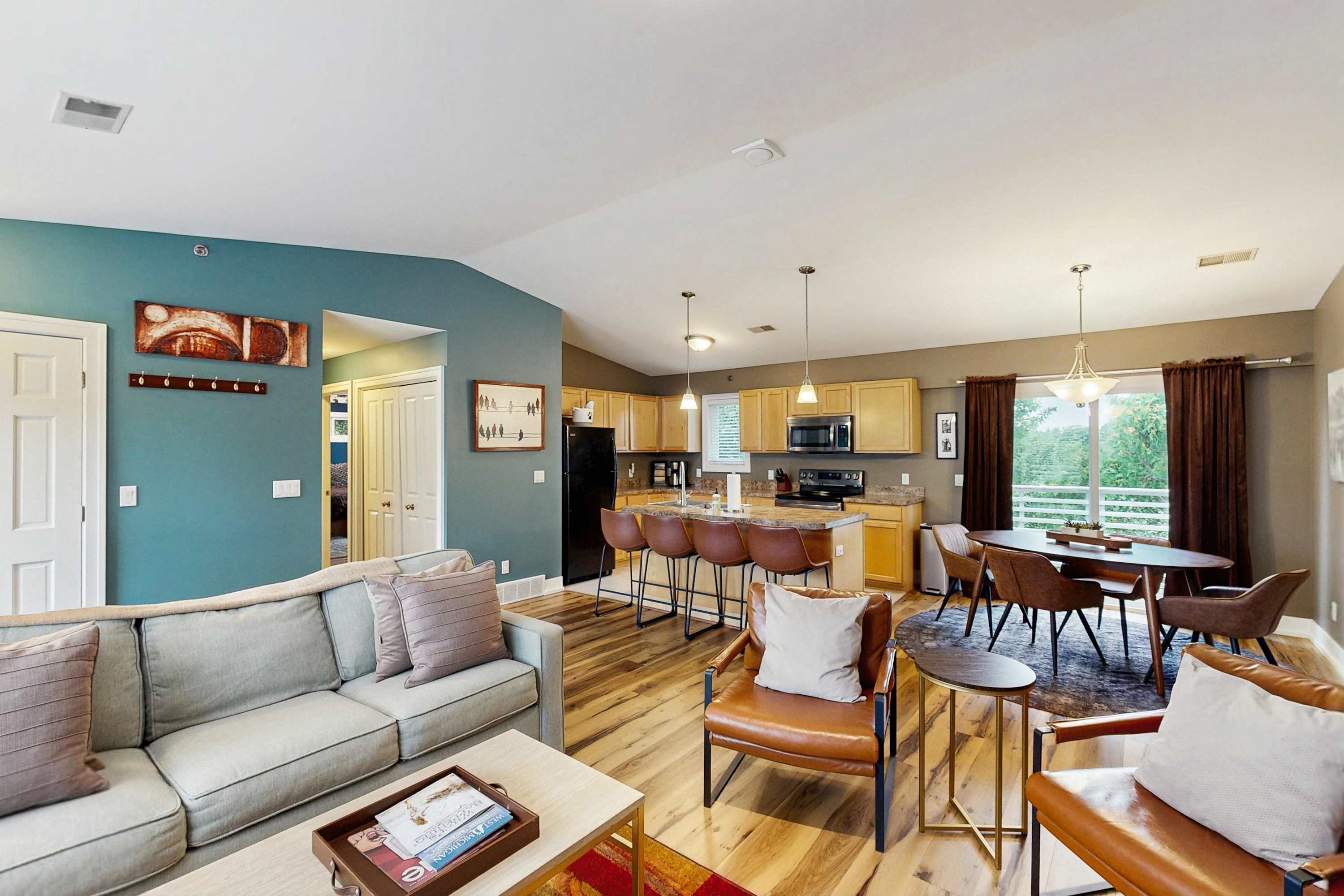 Stylish dog-friendly retreat with furnished deck, pool, & firepits