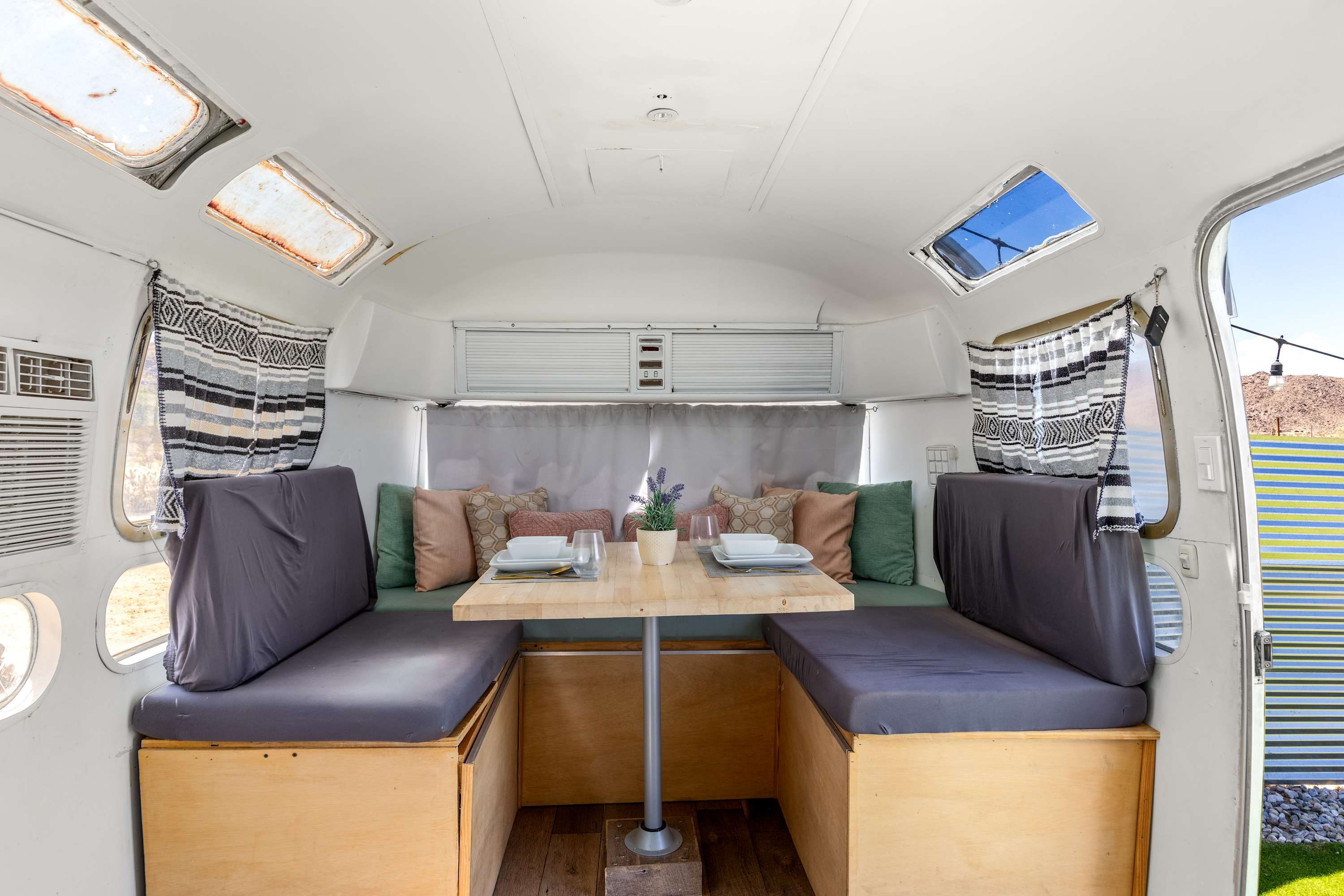 Quaint Dining Nook with u-shaped seating for sharing meals or a private quiet work space.