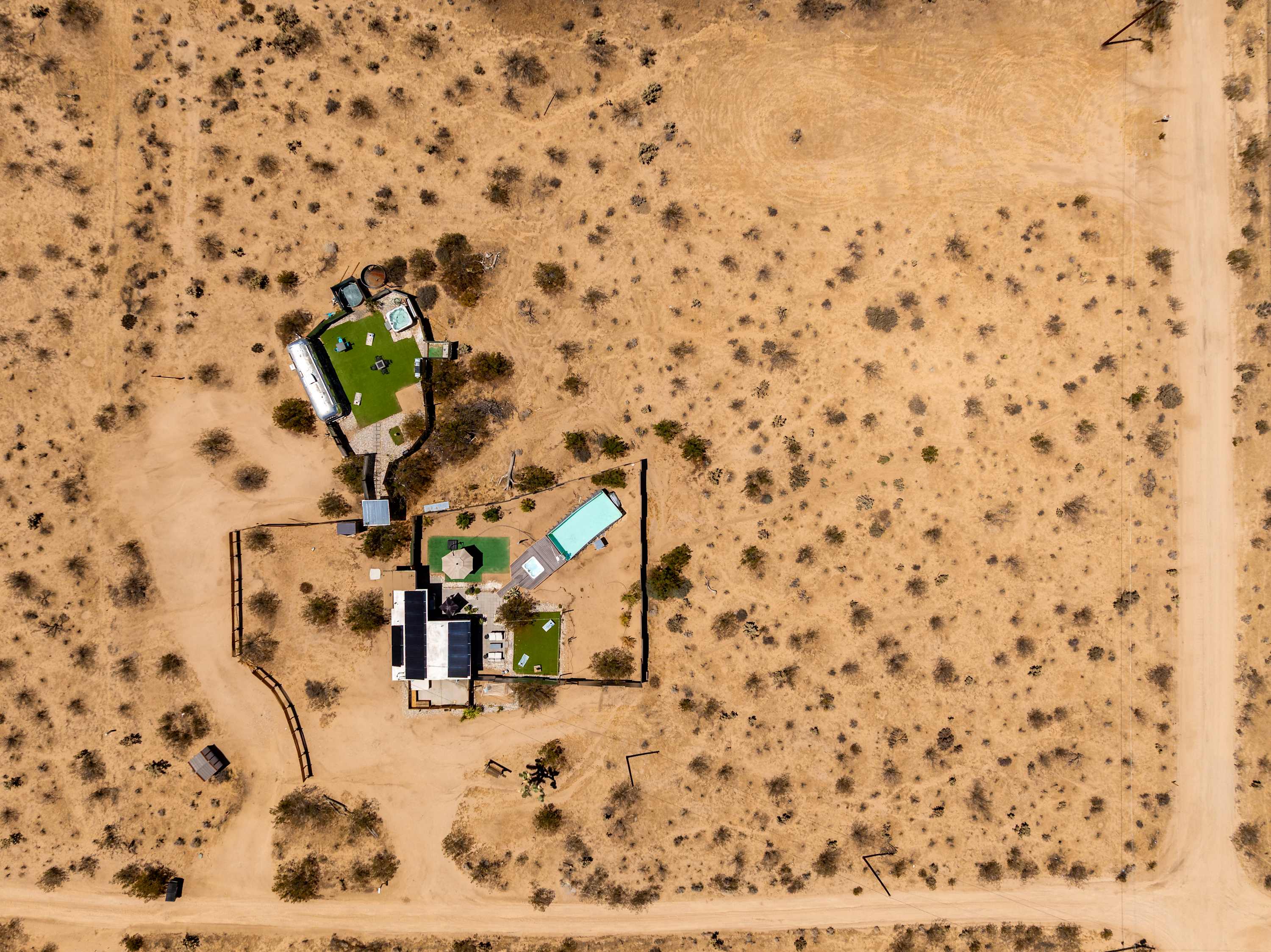 Aerial view of the entry to Compound with the street view.