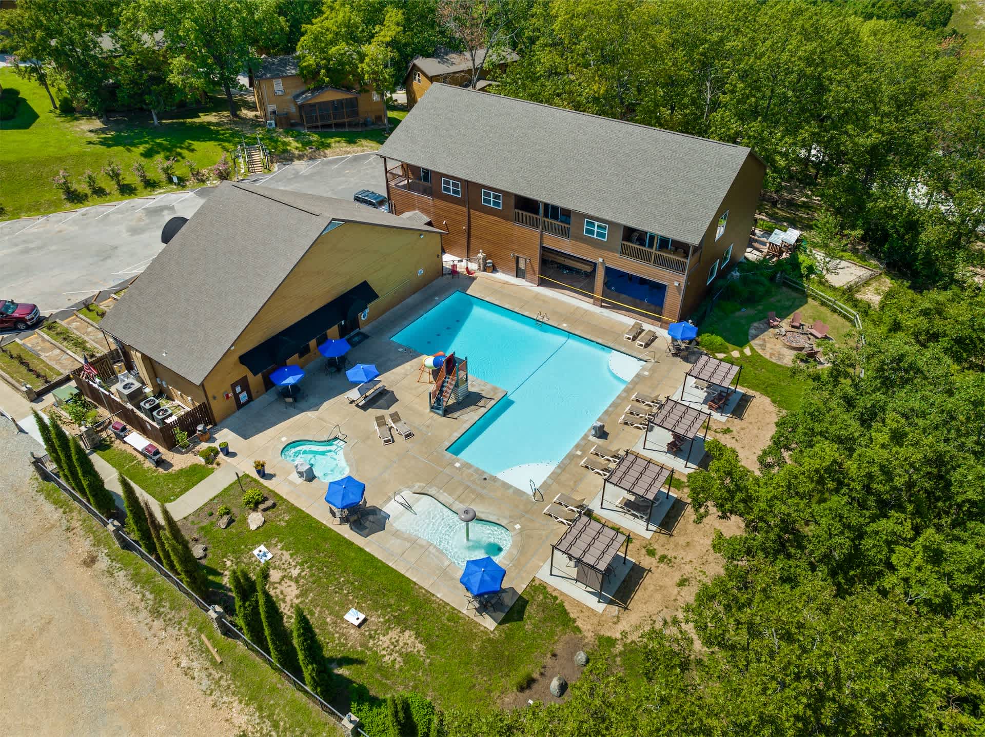 Outdoor pool, hot tub, and kiddie pool