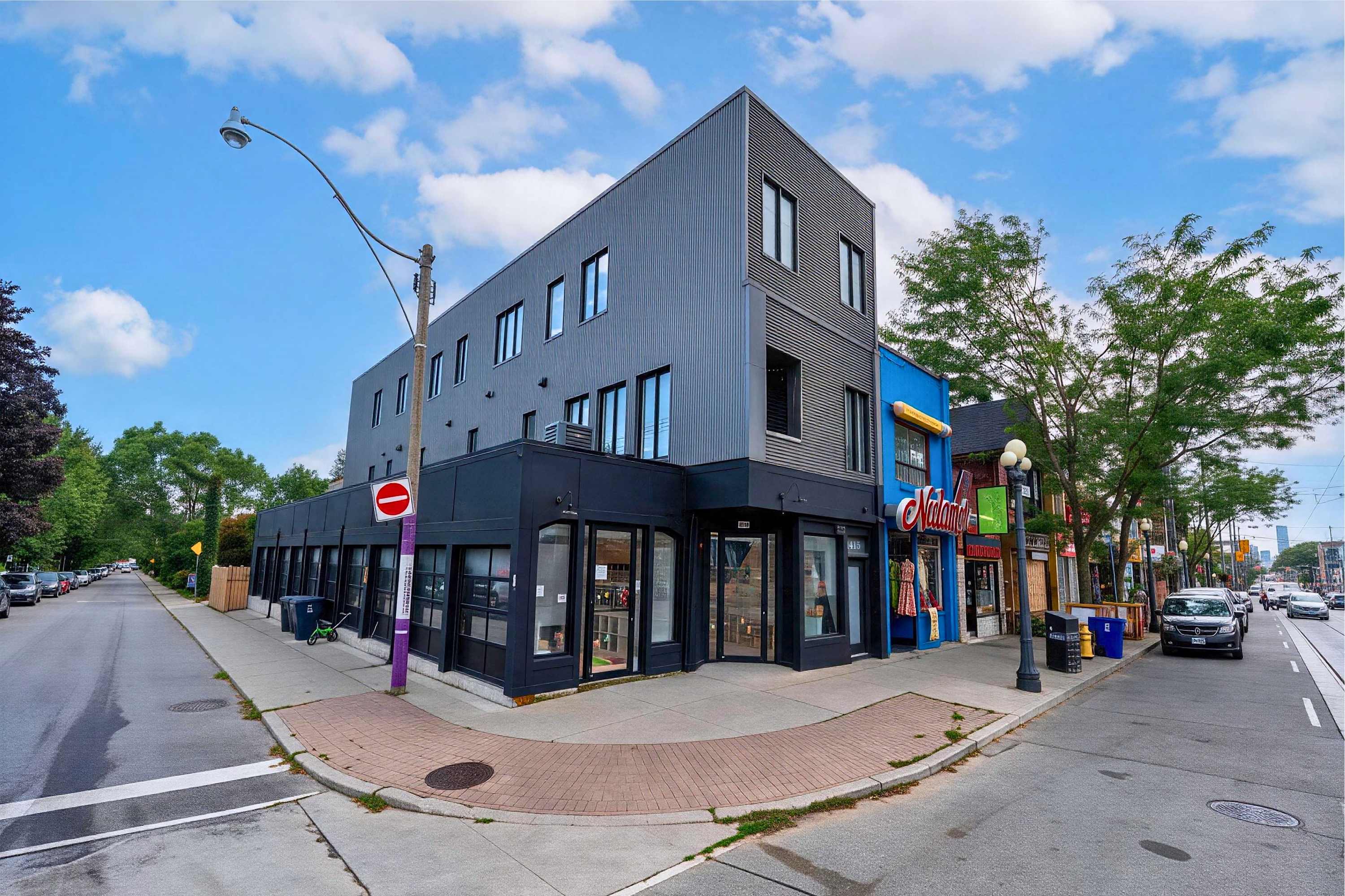 Prime corner building placement steps away from vibrant local spots.