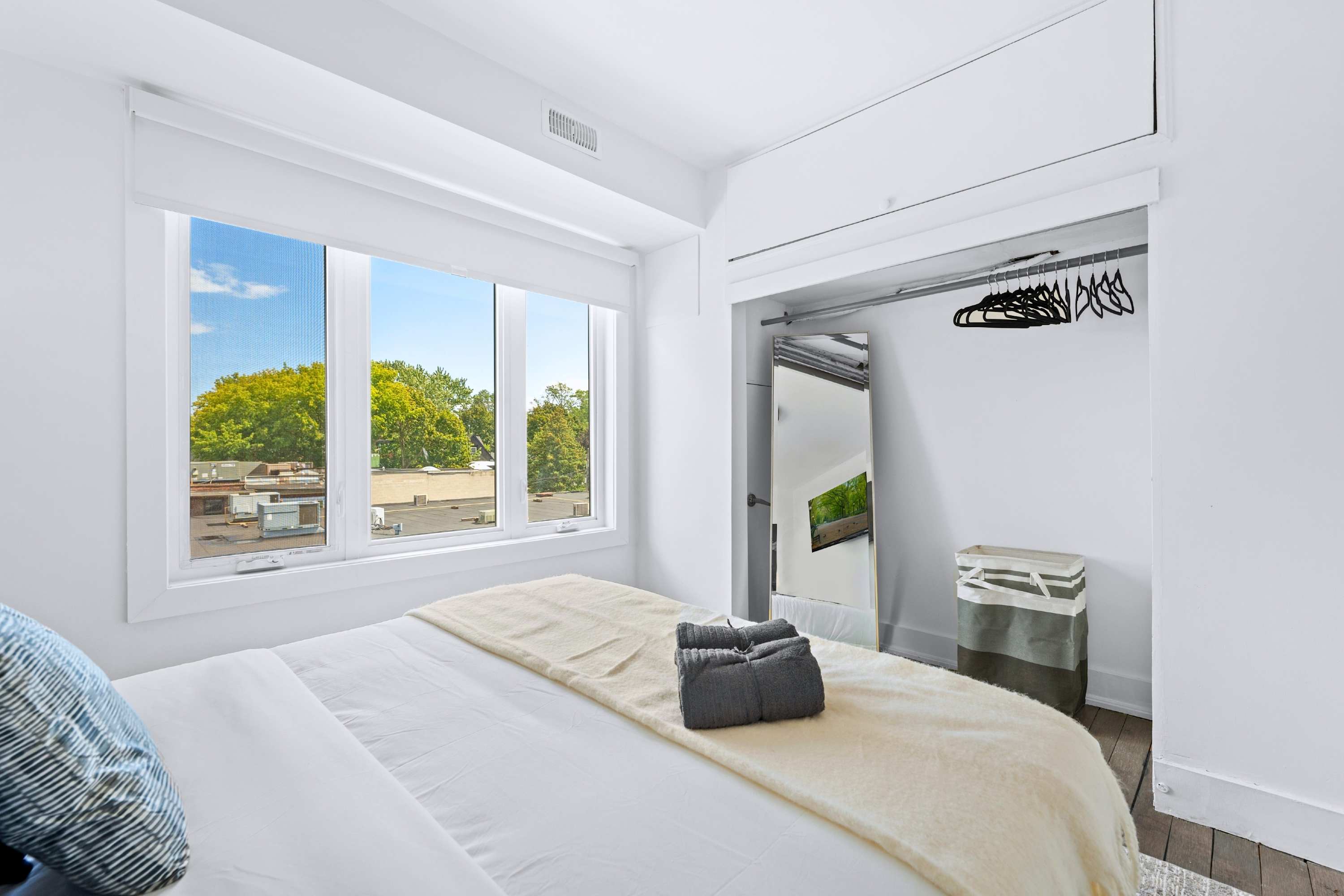 Flooded with natural sunlight and complete with a full-length mirror.