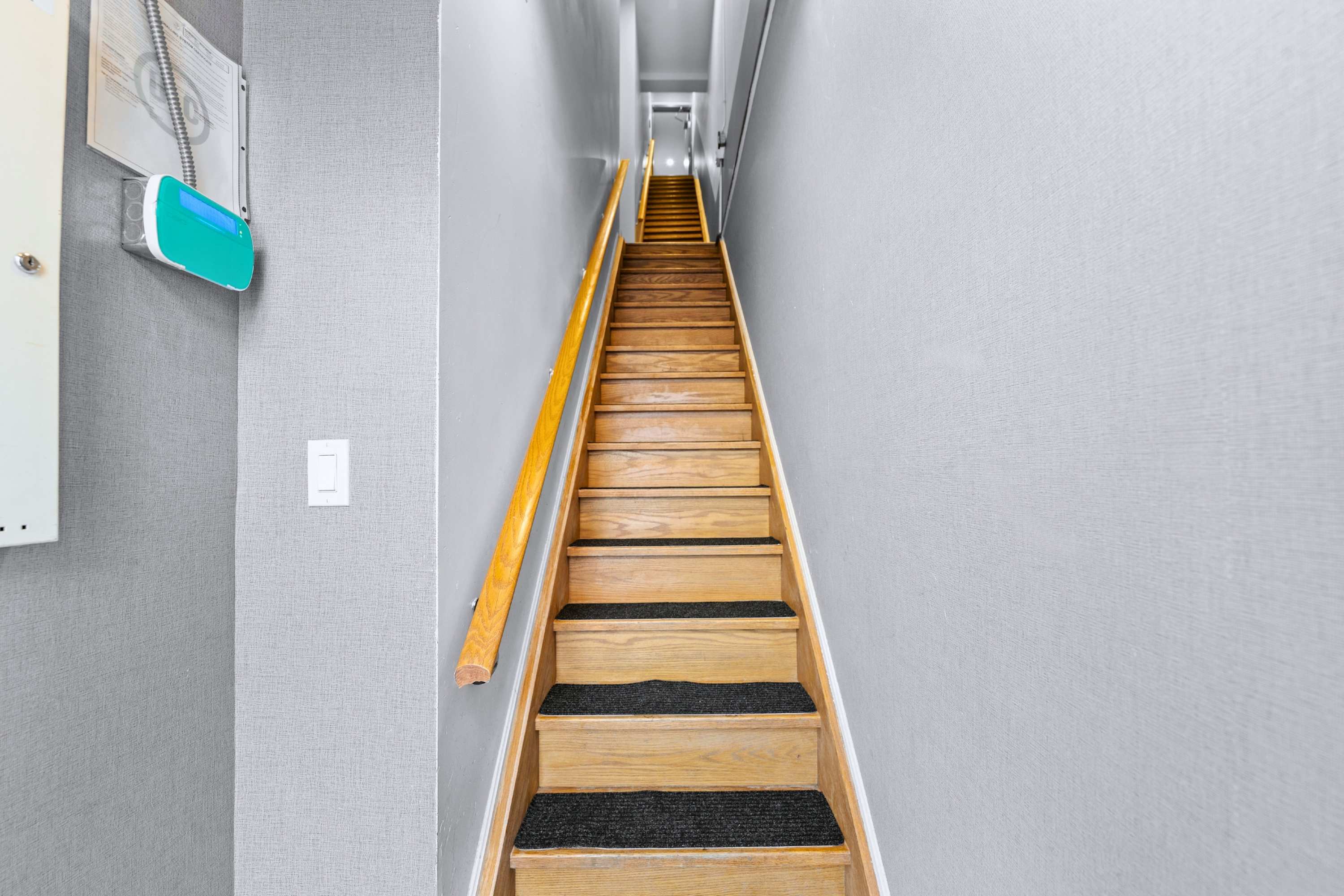 Private interior entrance leading directly up to your quiet retreat.