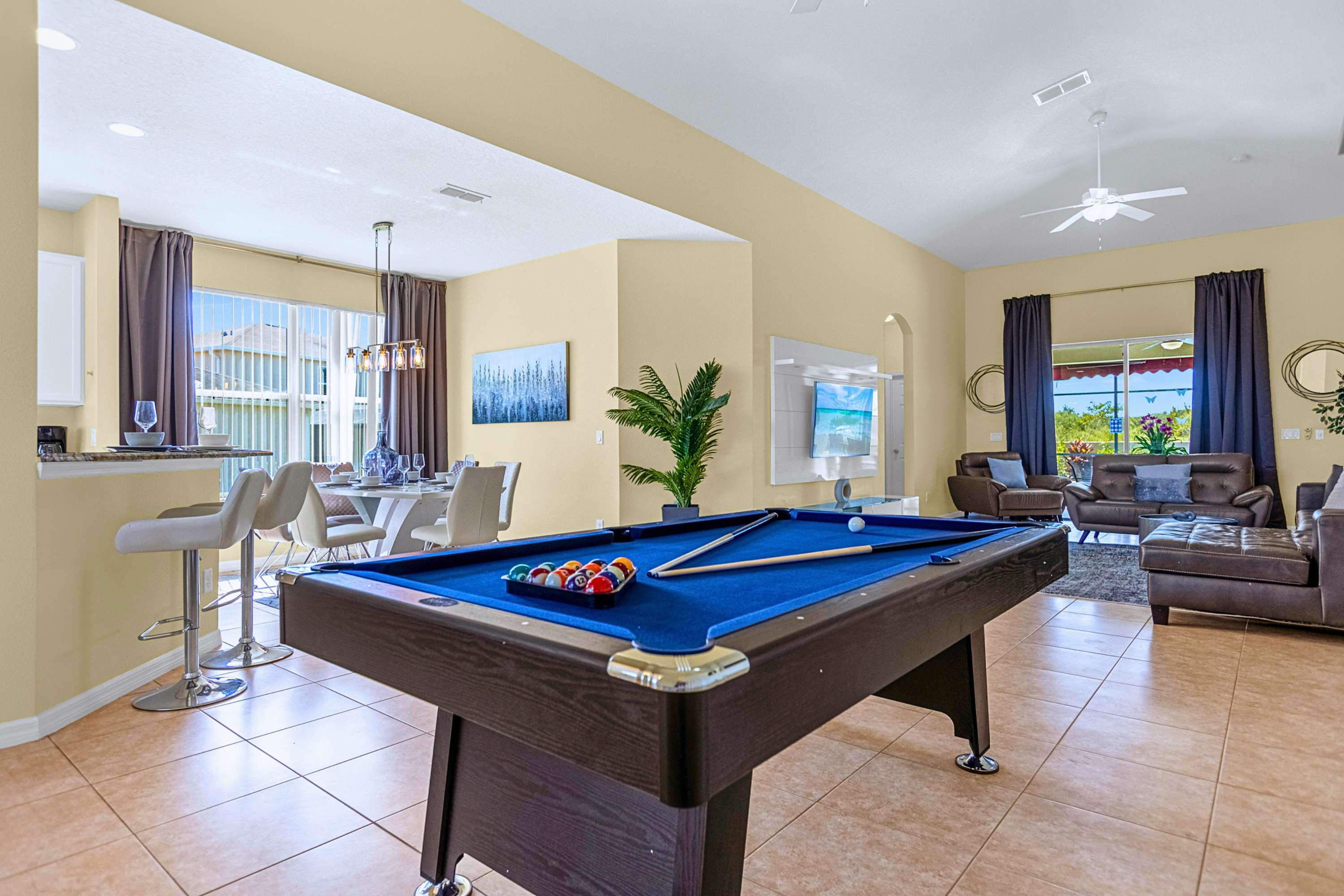 Game night ready: enjoy billiards steps from the kitchen & lounge.