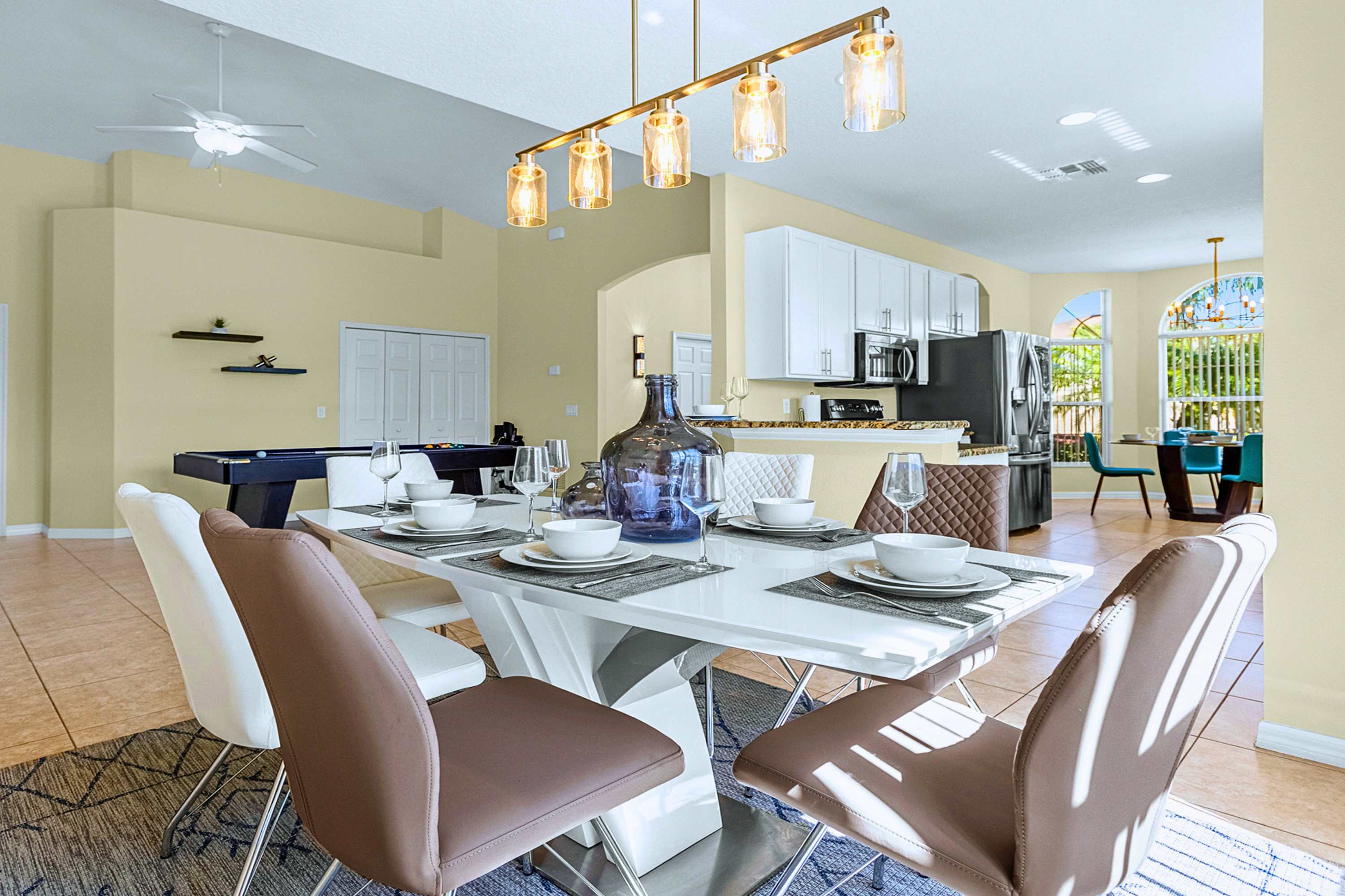 Perfect for group dinners: stylish six-guest dining with ambient lights.