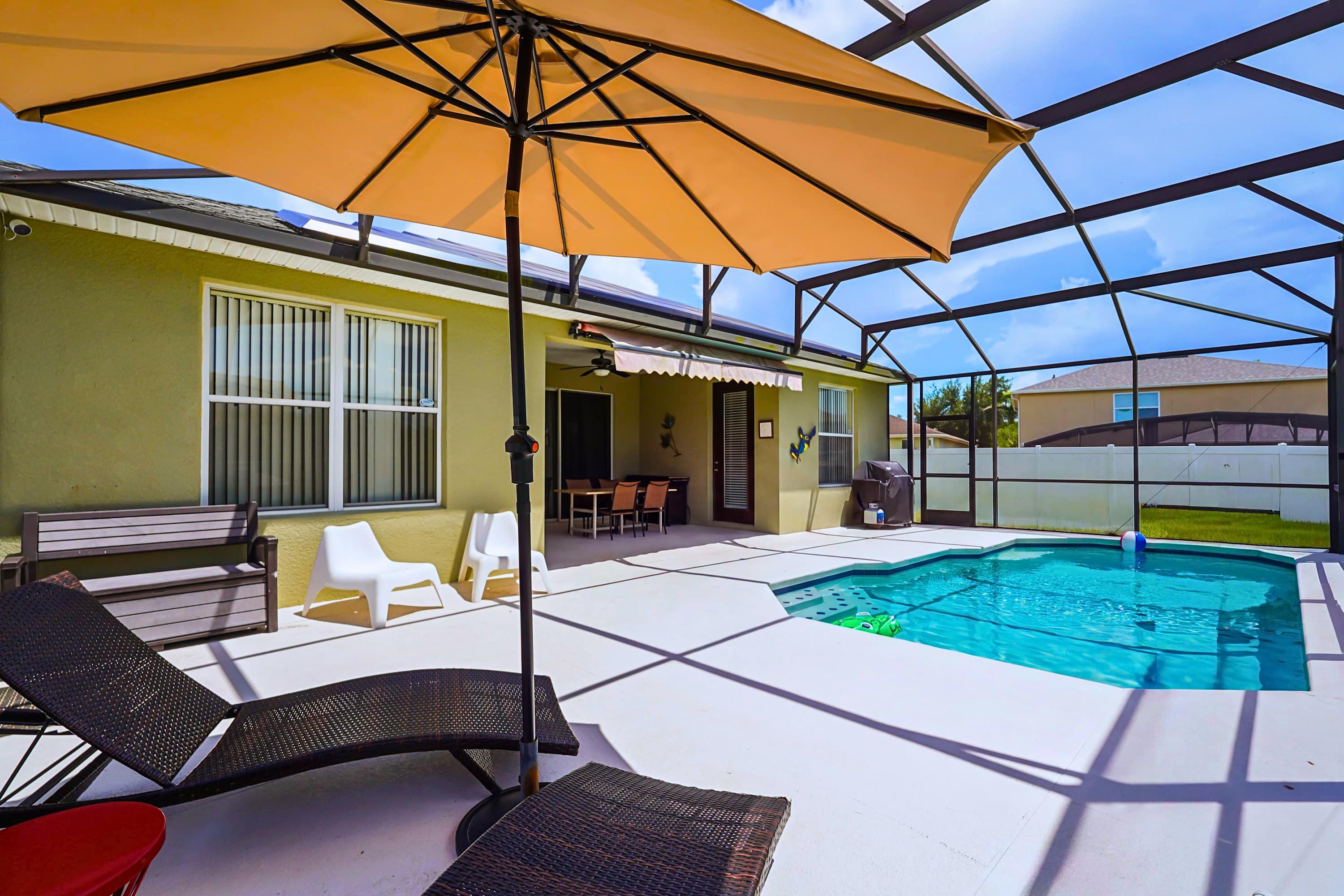 Soak up the sun or relax in the shade by your private pool