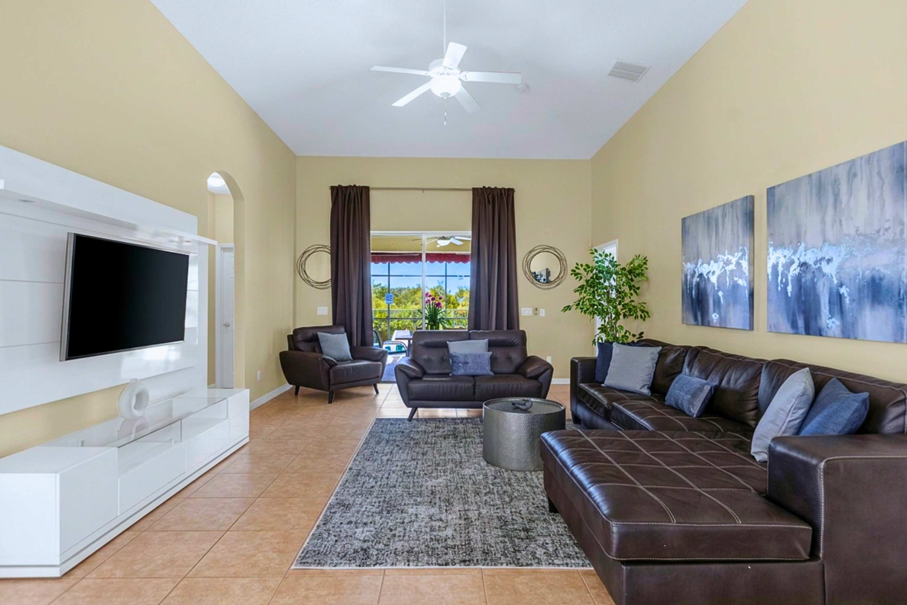 Relax on the spacious couch, watch TV, or step right out to the pool