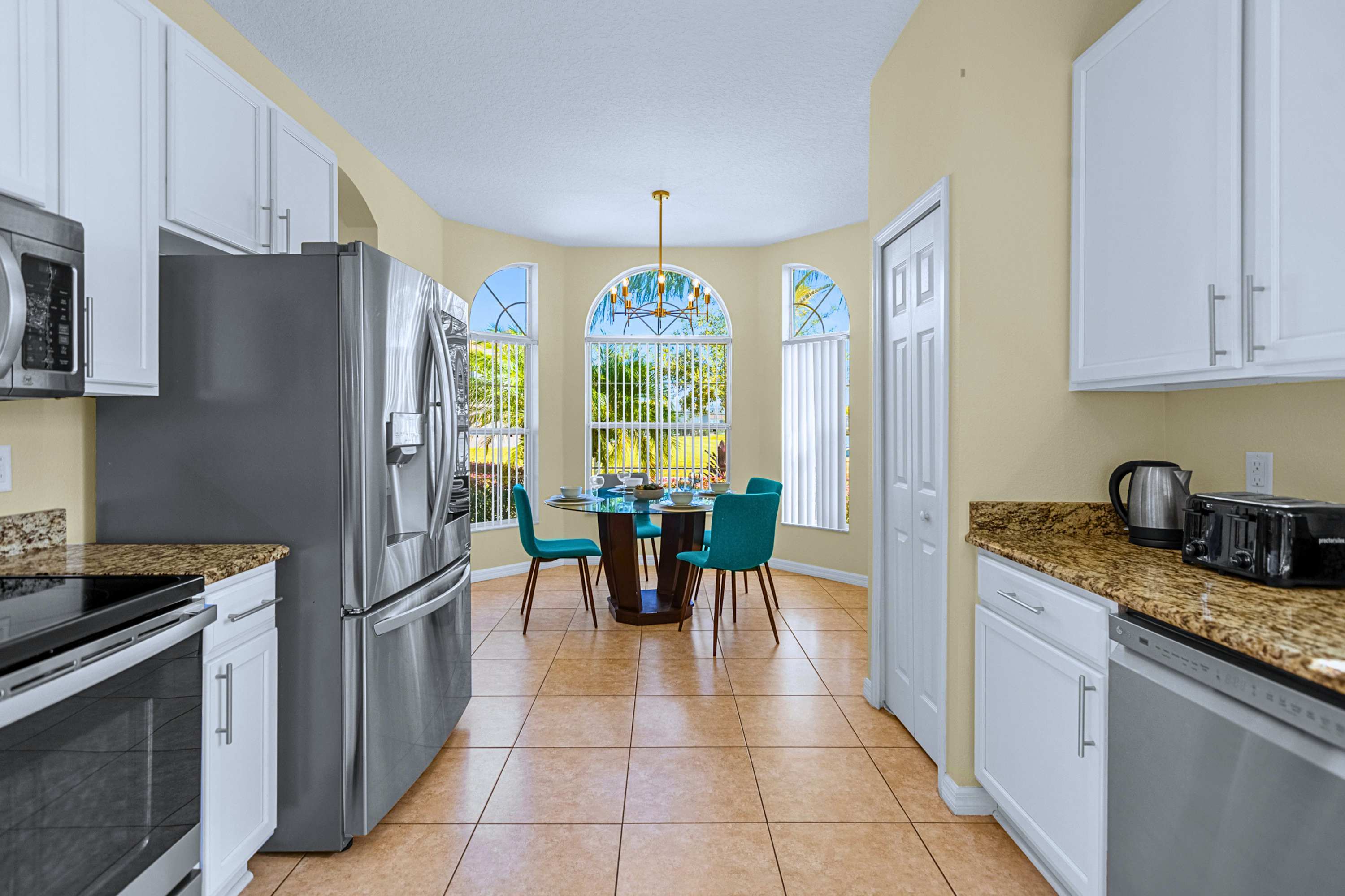 Cook and entertain effortlessly: functional kitchen steps from dining.