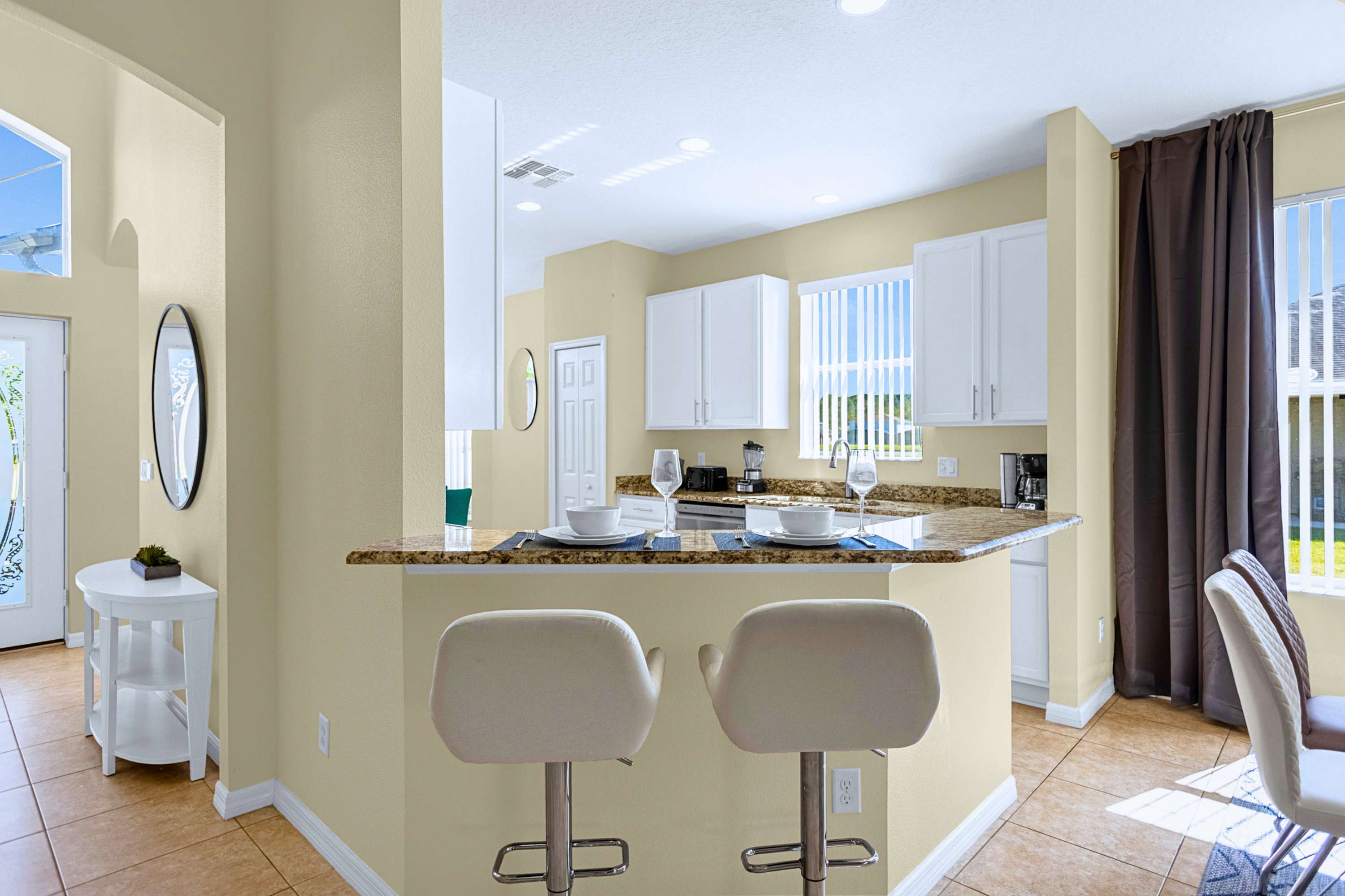 Convenient kitchen counter seating for 2 for casual dining & drinks.