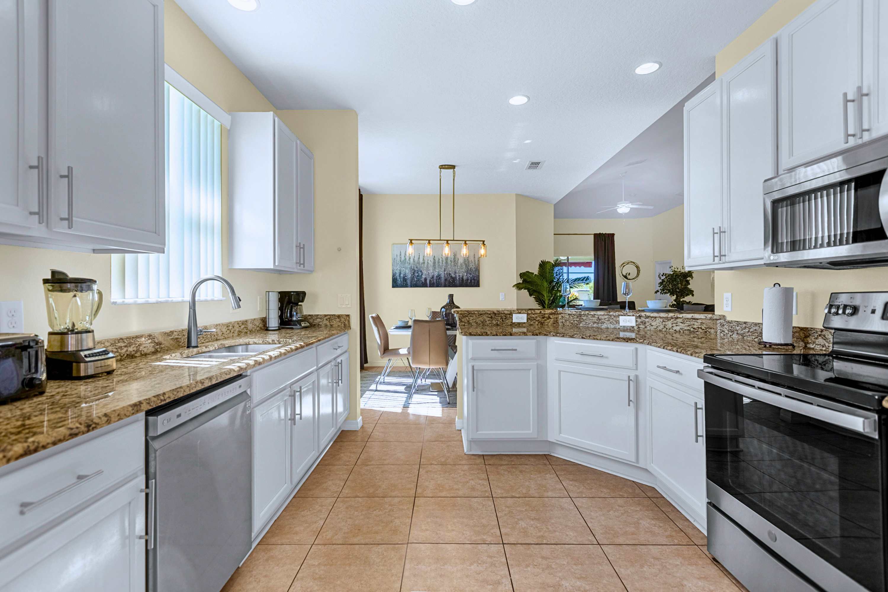 Fully equipped chef's kitchen with generous counter space for meal prep.
