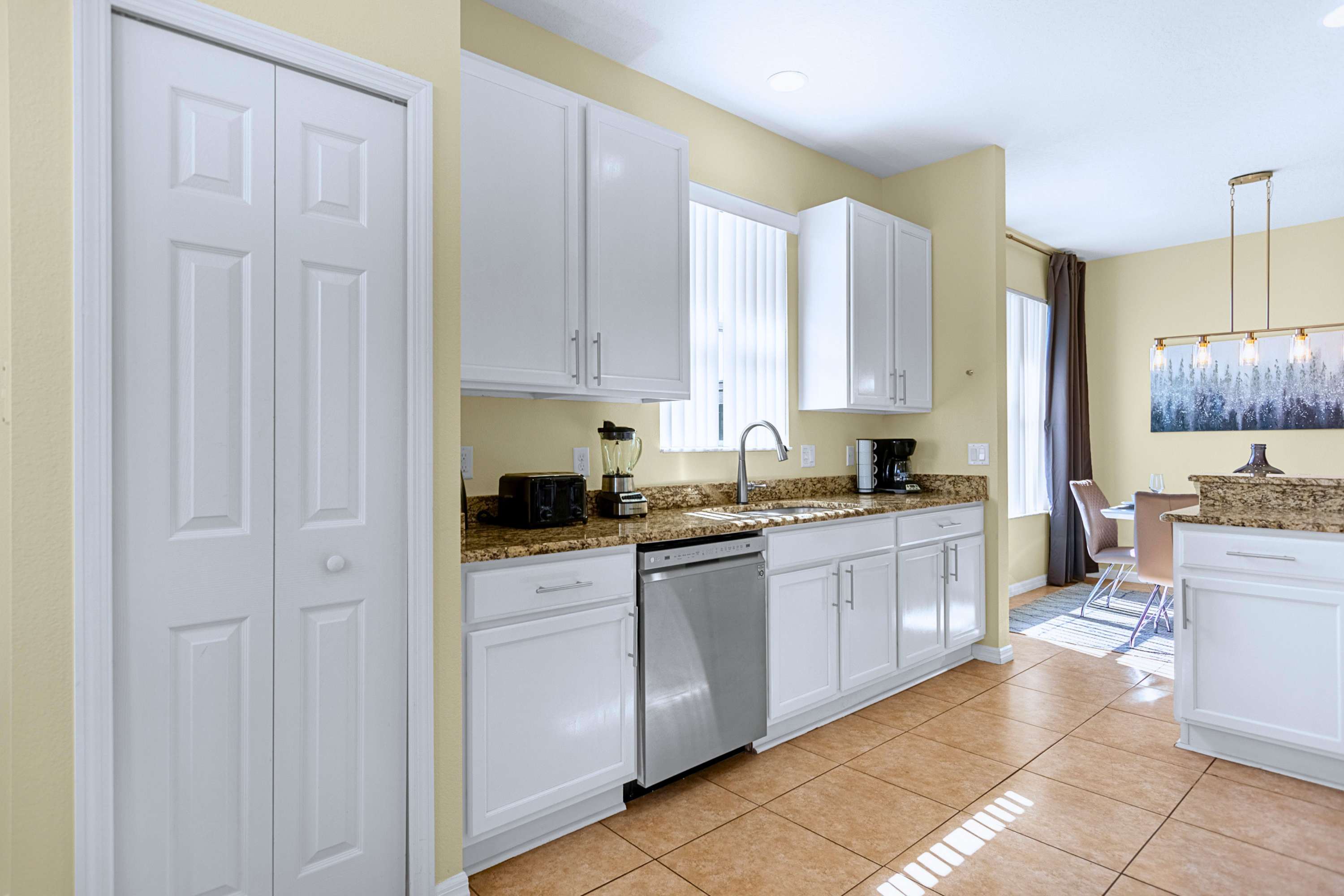 Cook with ease in this spacious kitchen stocked with all essentials!