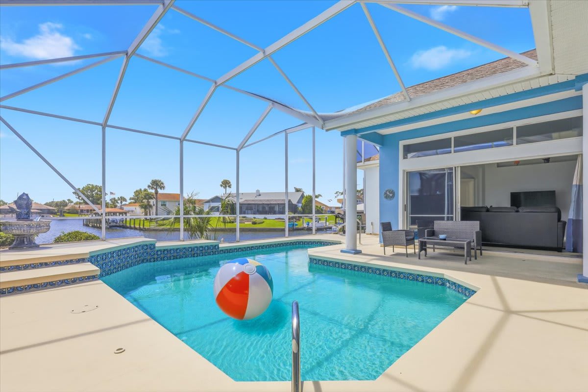 Relaxing Canal Home with Pool & Sunset Views