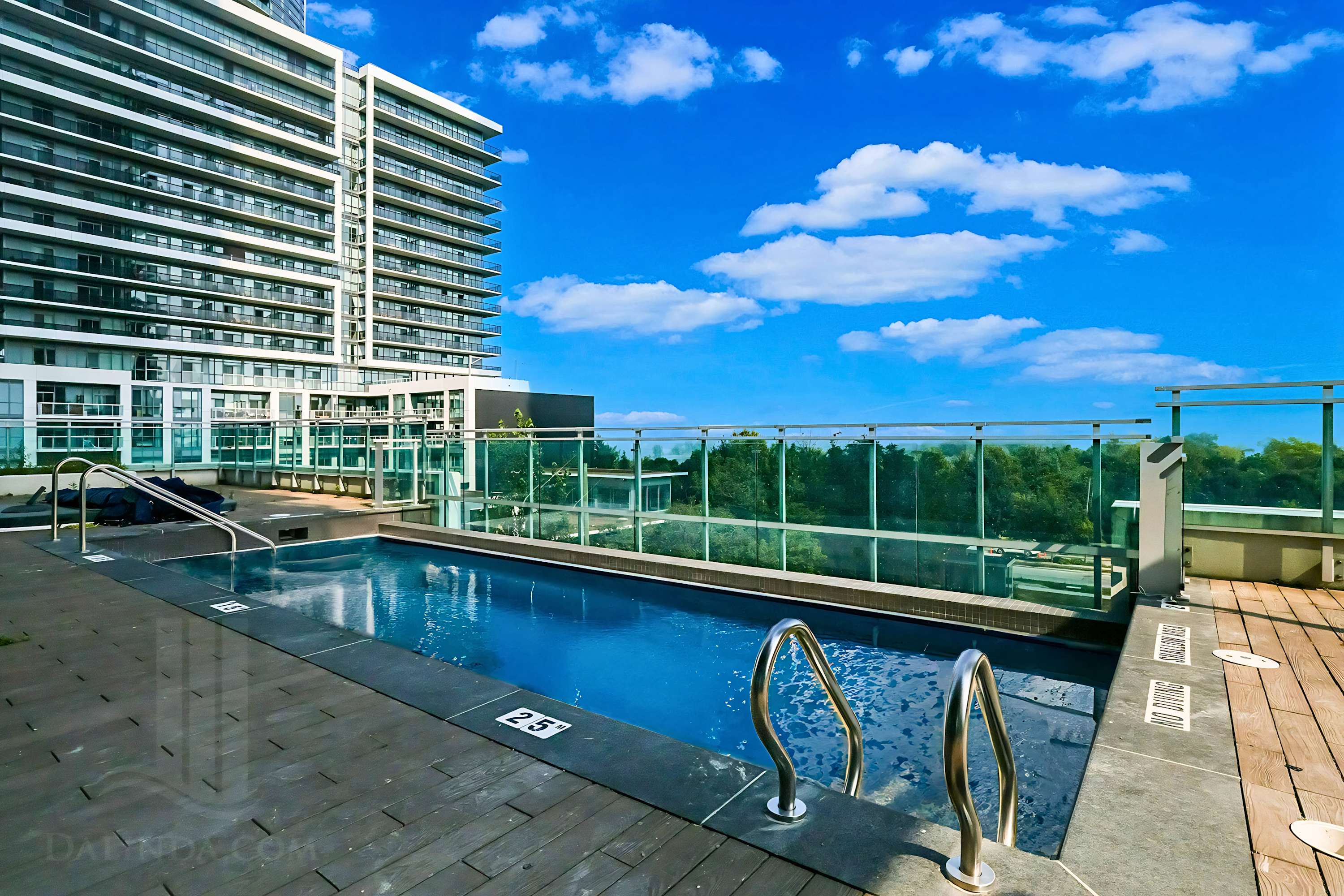 Building Amenities: Swim and relax in the common pool area