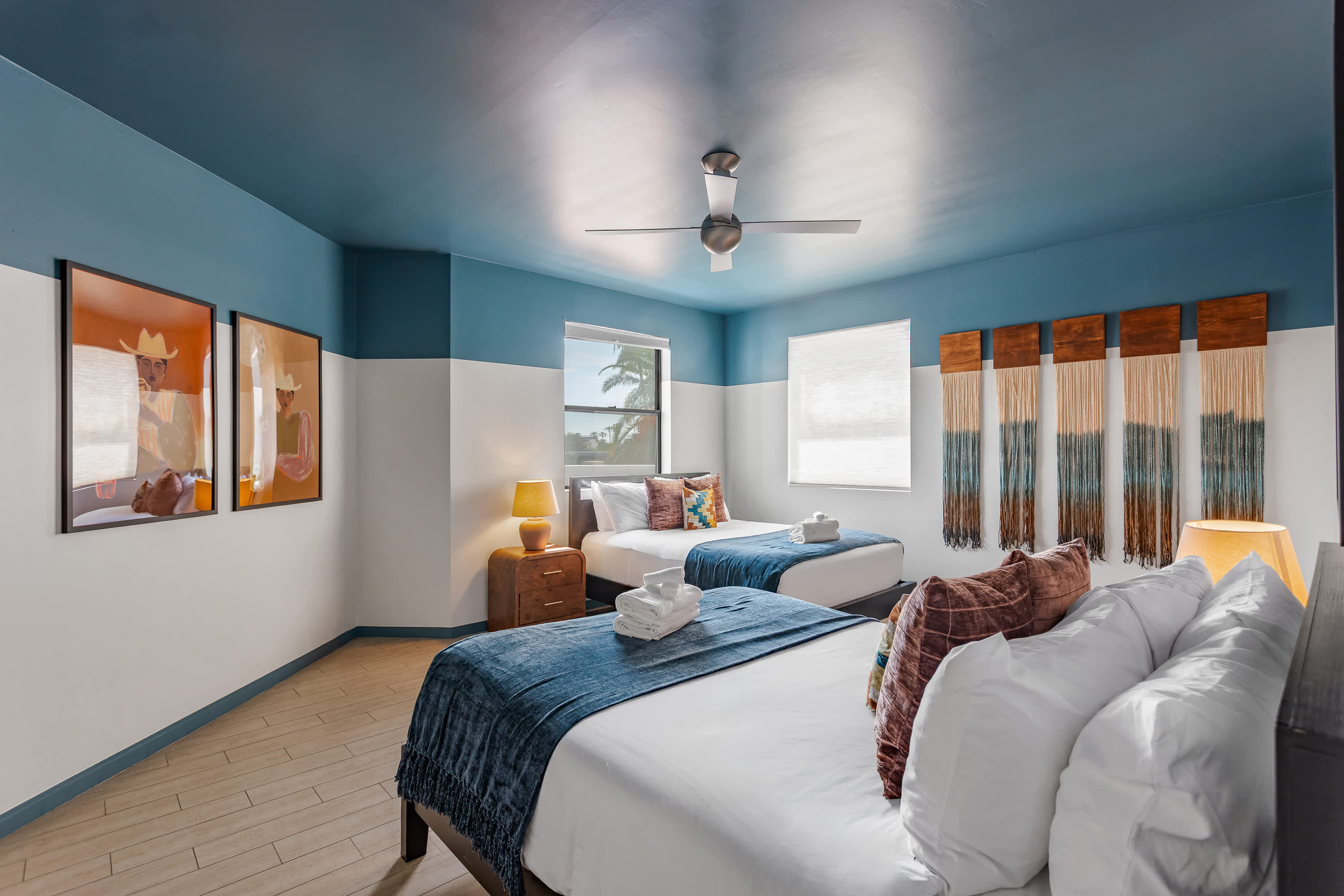 Second bedroom featuring two Queen beds, direct access to the Jack-and-Jill bathroom, and a spacious layout designed for a comfortable and restful stay.